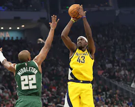 Pascal Siakam (43) of the Indiana Pacers shoots over Khris Middleton (22) of the Milwaukee Bucks, as we offer our best Bucks vs. Pacers player props for Game 3 on Friday.