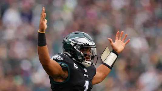 Jalen Hurts of the Philadelphia Eagles reacts after scoring a touchdown during the first quarter against the New Orleans Saints at Lincoln Financial Field in Philadelphia, Pennsylvania. Photo by Mitchell Leff Getty Images via AFP.