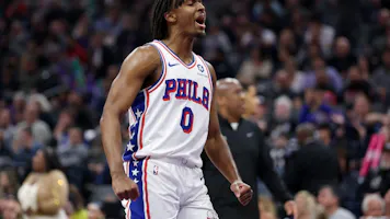 Tyrese Maxey #0 of the Philadelphia 76ers reacts as we look at the latest 2024 NBA Most Improved Player award odds at the end of the regular season.