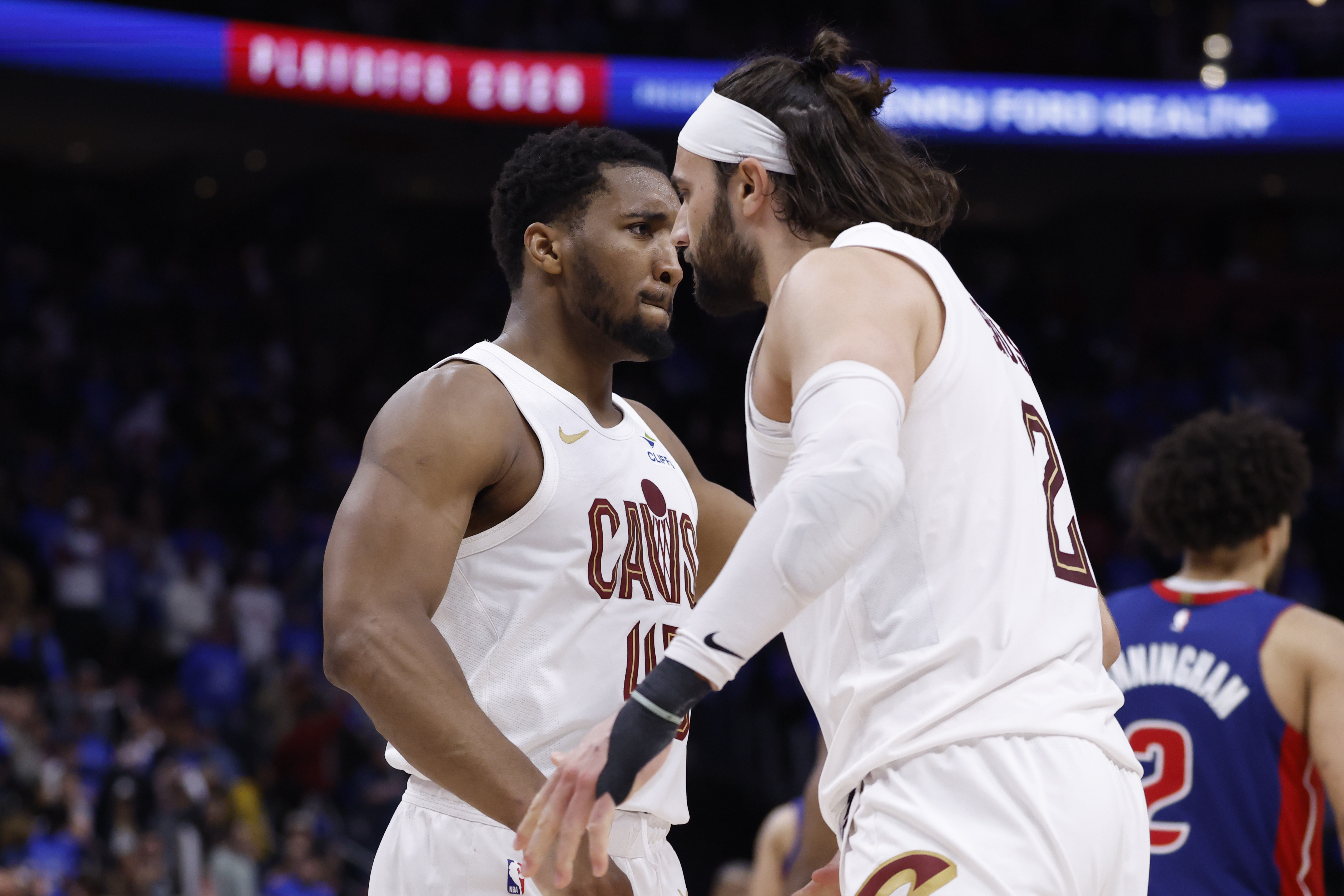 Cleveland Cavaliers guard Donovan Mitchell - who's featured in my Pistons vs. Cavaliers player props - and guard/forward Max Strus (2) celebrate. 