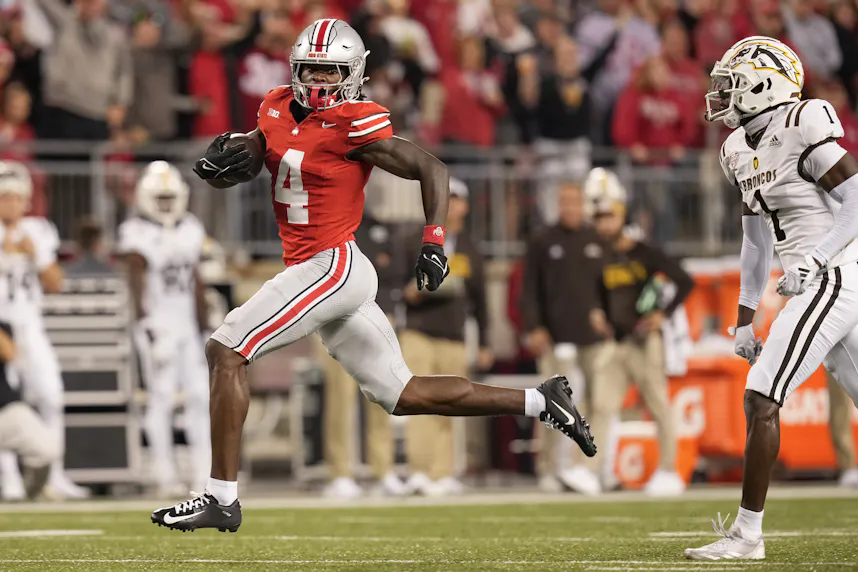 Ohio State wide receiver Jeremiah Smith scores a touchdown against Western Michigan. We're backing Smith in our Iowa vs. Ohio State player prop bet.