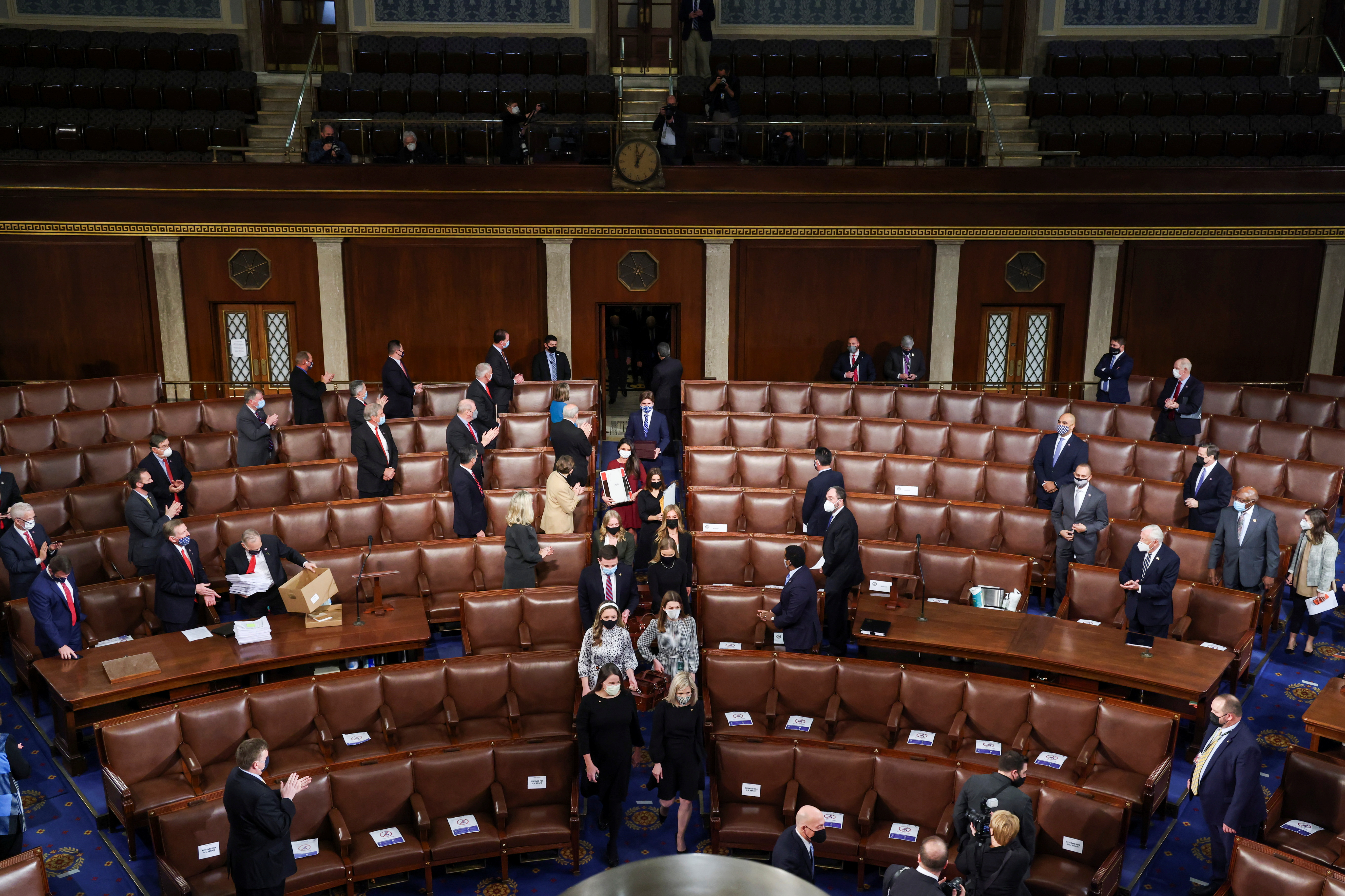 Boxes of votes are carried inside the House Chamber on Capitol Hill as we look at FanDeuel and DraftKings increasing spending.