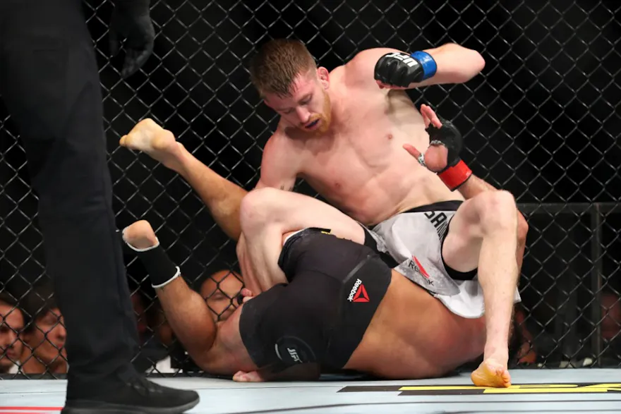 Raphael Assuncao and Cory Sandhagen fight from the ground in the second round during their Bantamweight Bout at UFC 241 at Honda Center in August 2019.