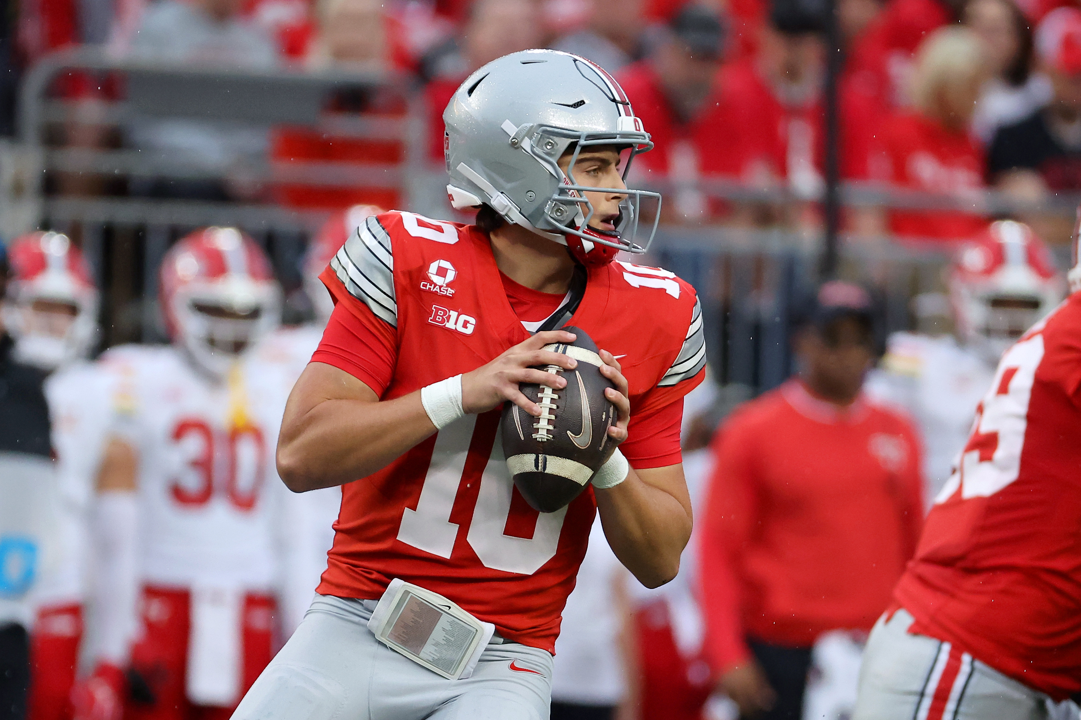 Ohio State Buckeyes quarterback Julian Sayin (10) drops back to pass as we break down our Ohio State vs. Indiana same-game parlay.