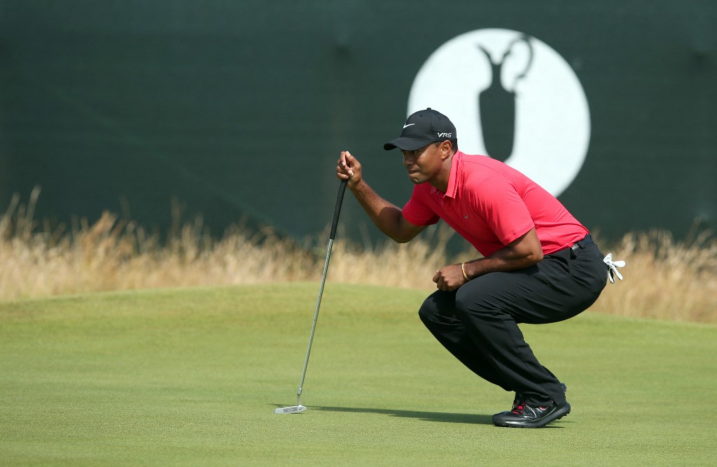 U.S. golfer Tiger Woods lines up his putt as we look at the Open Championship odds.
