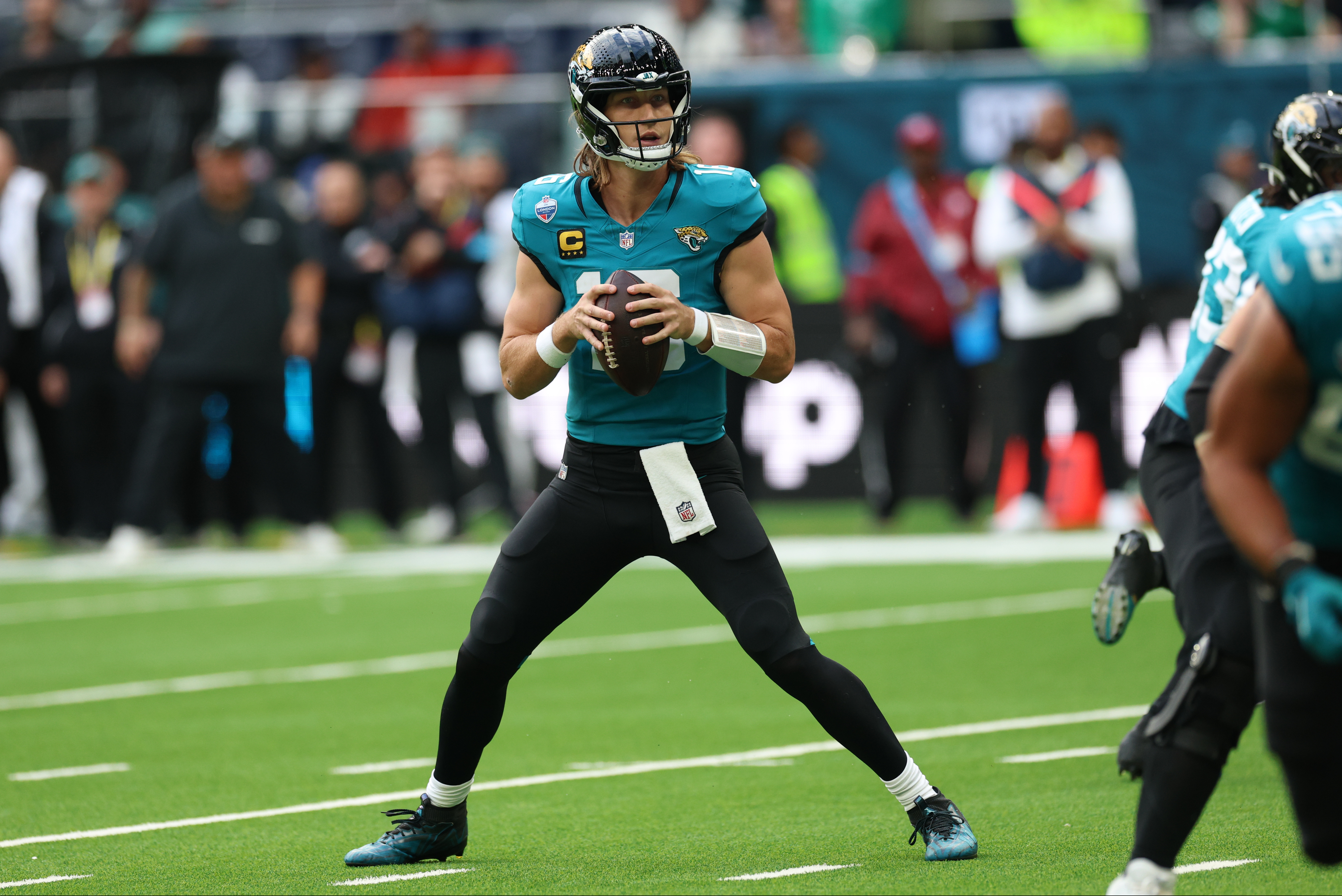Jacksonville Jaguars quarterback Trevor Lawrence (16) drops back to pass as he is featured in our NFL MVP odds and predictions after Week 5.