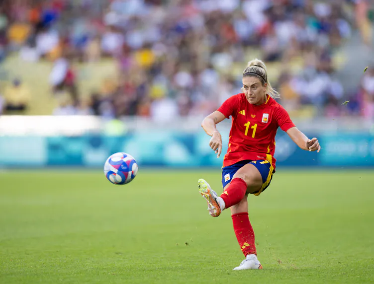 Alexia Putellas shoots the ball during the Paris 2024 Olympic Games as we offer our predictions for the Spain vs. Germany women's bronze medal match.