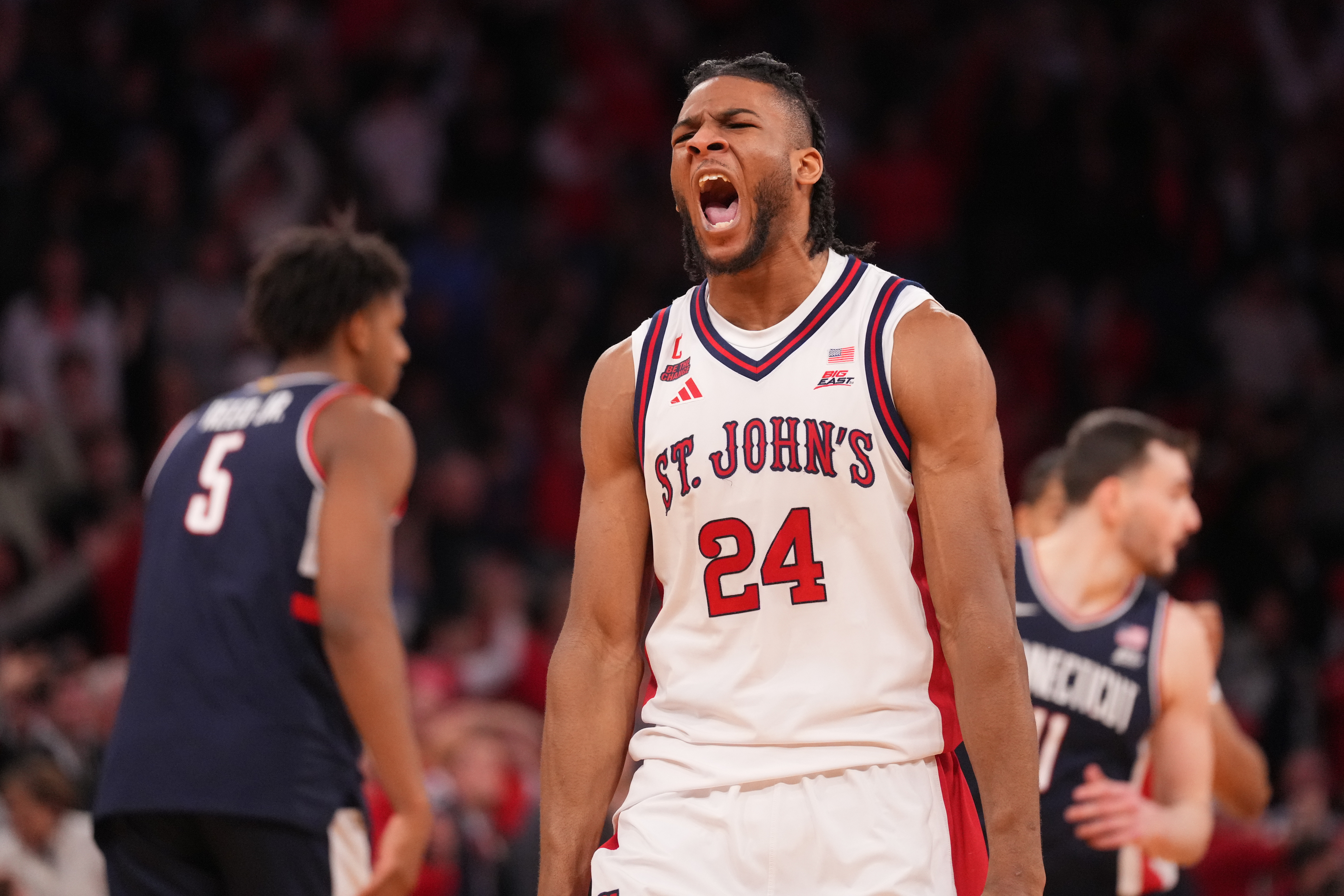 St. John's Red Storm forward Zuby Ejiofor (24) reacts as we break down our St. John's vs. Kansas prediction.