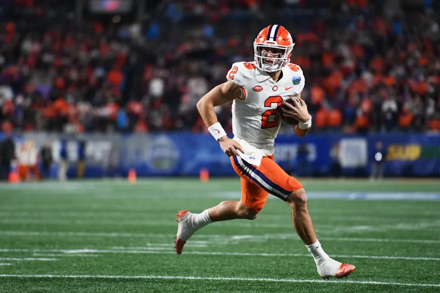 Cade Klubnik #2 of the Clemson Tigers runs for a second quarter touchdown against the North Carolina Tar Heels during the ACC Championship game at Bank of America Stadium on December 03, 2022 in Charlotte, North Carolina.