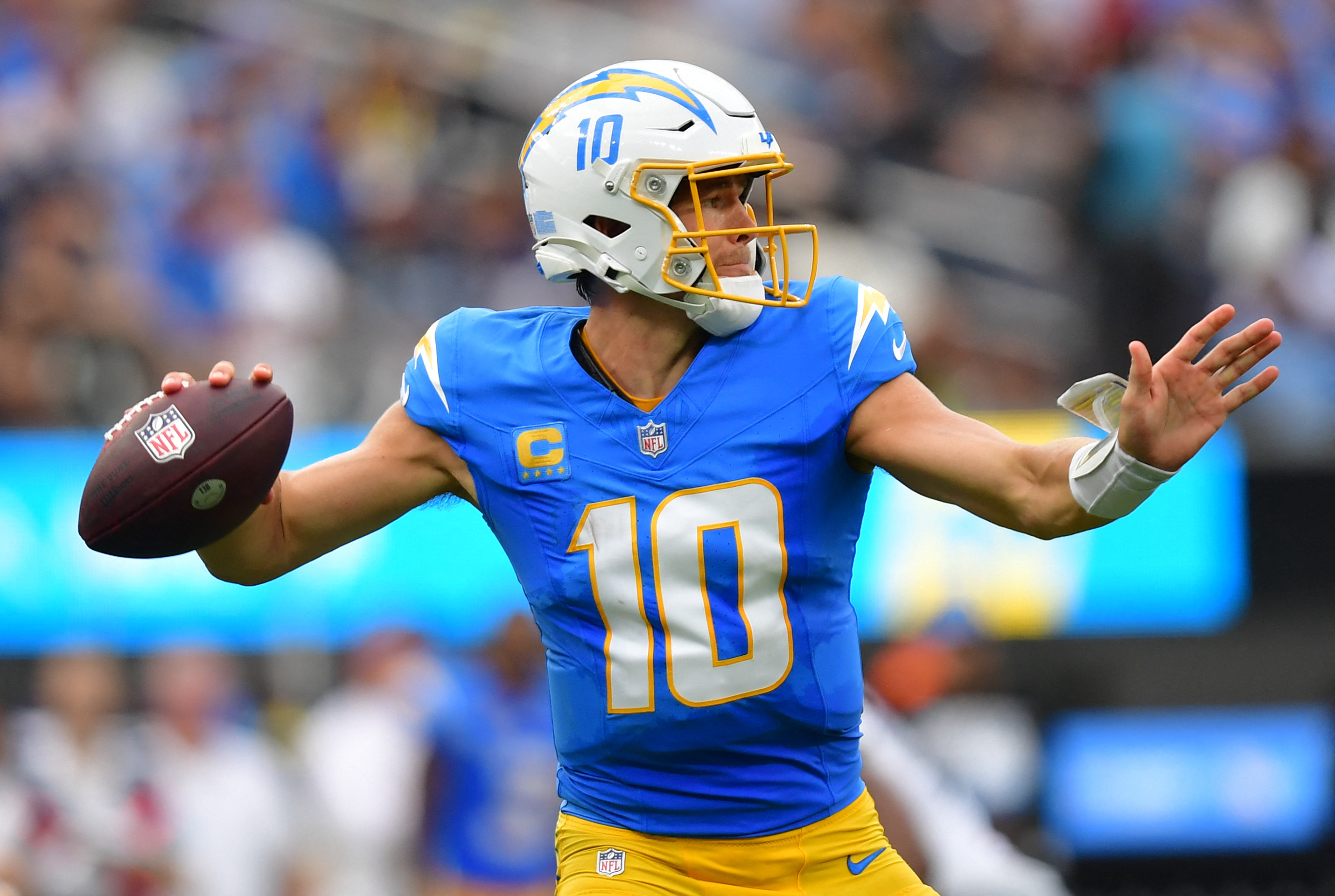 Pictured: Chargers quarterback Justin Herbert, who is featured in our NFL Best Bets for Week 3: Expert Picks & Predictions. Photo by Gary A. Vasquez-Imagn Images.