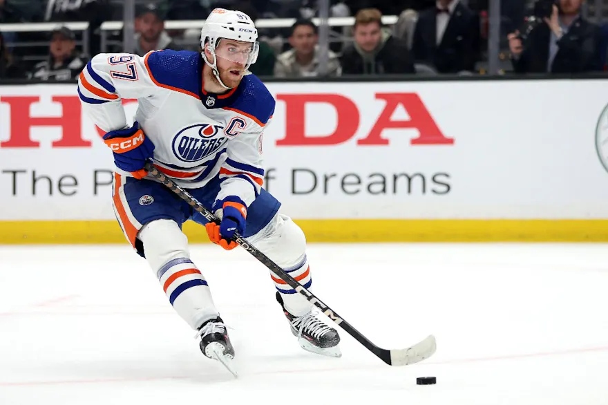 Connor McDavid (97) of the Edmonton Oilers controls the puck as we offer our best Oilers vs. Canucks predictions for Game 1 on Wednesday.