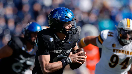 Air Force Falcons quarterback Liam Szarka (9) runs the ball as we make our best Army vs. Air Force prediction.