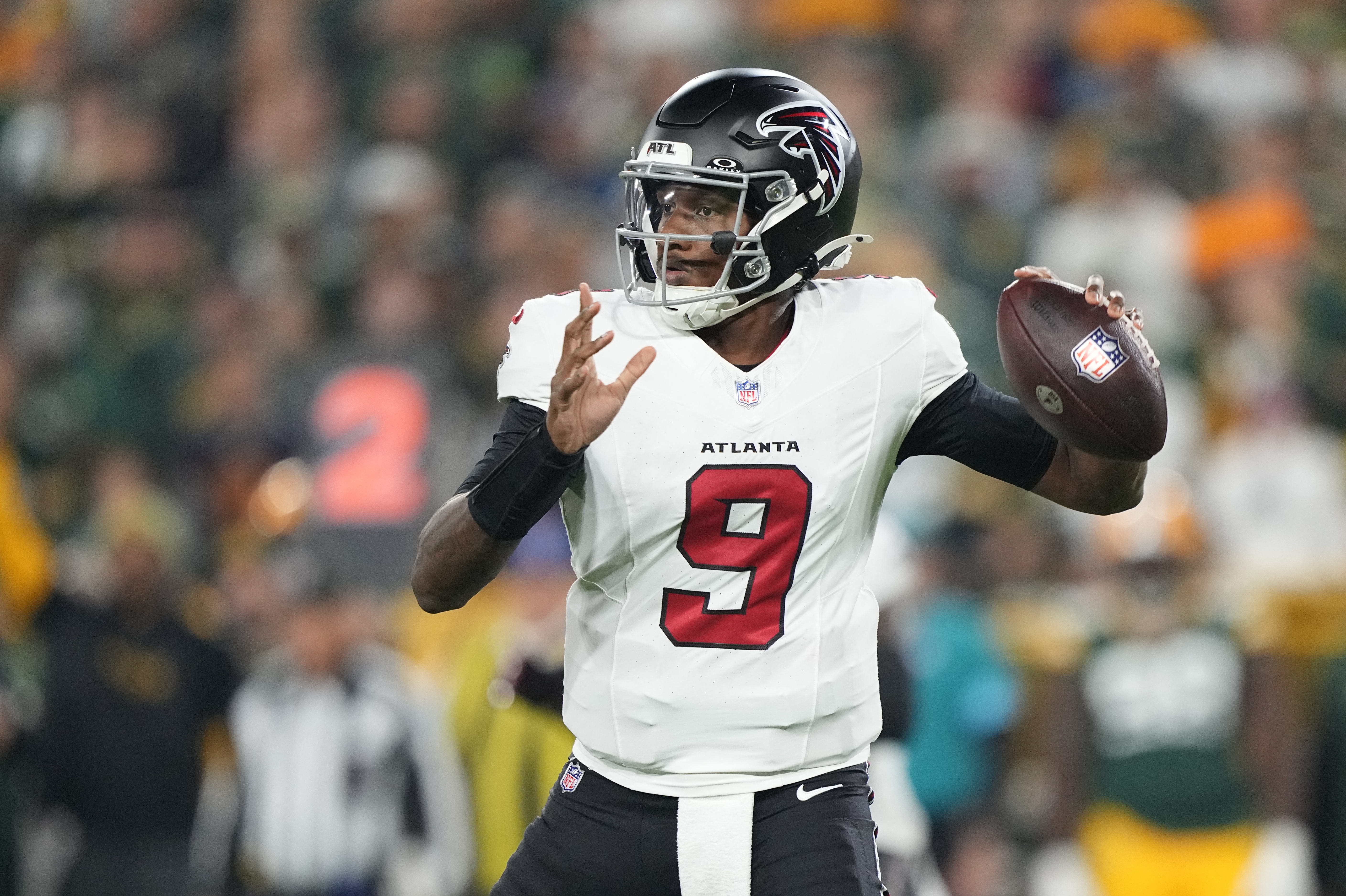 Falcons quarterback Michael Penix Jr. (9) looks to pass as we break down our Falcons vs. Saints prediction.