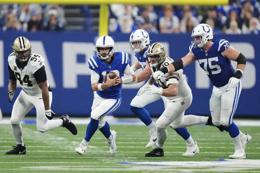 Colts QB Gardner Minshew rushes the football as part of our Week 9 NFL predictions for Colts vs. Panthers