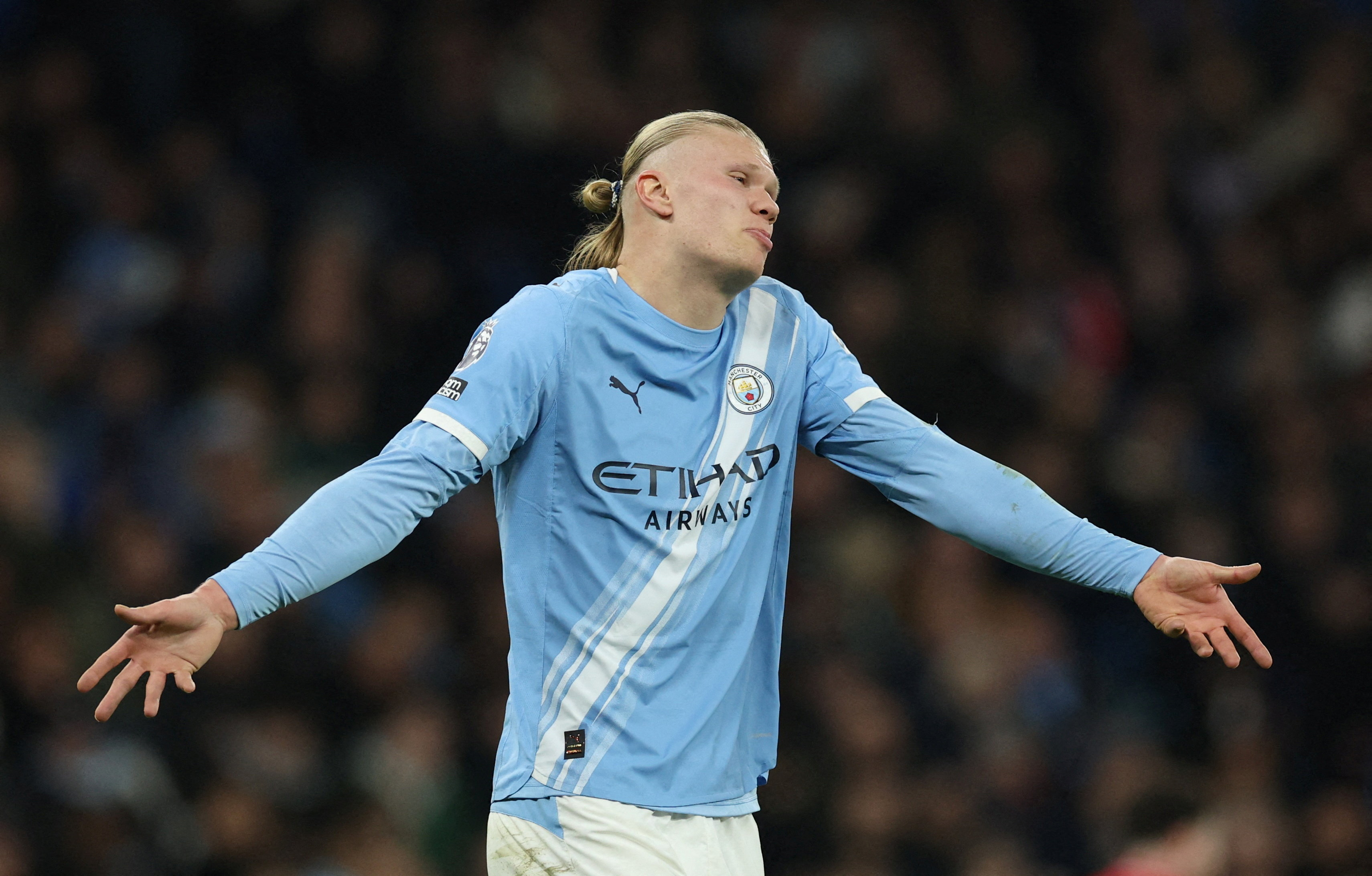 Manchester City's Erling Haaland looks dejected as we break down our Real Madrid vs. Man City prediction & odds.