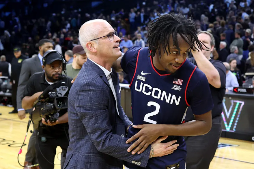 Head coach Dan Hurley and Tristen Newton #2 of the Connecticut Huskies react as we make our March Madness picks and predictions for the 2024 NCAA Tournament.