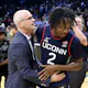 Head coach Dan Hurley and Tristen Newton #2 of the Connecticut Huskies react as we make our March Madness picks and predictions for the 2024 NCAA Tournament.