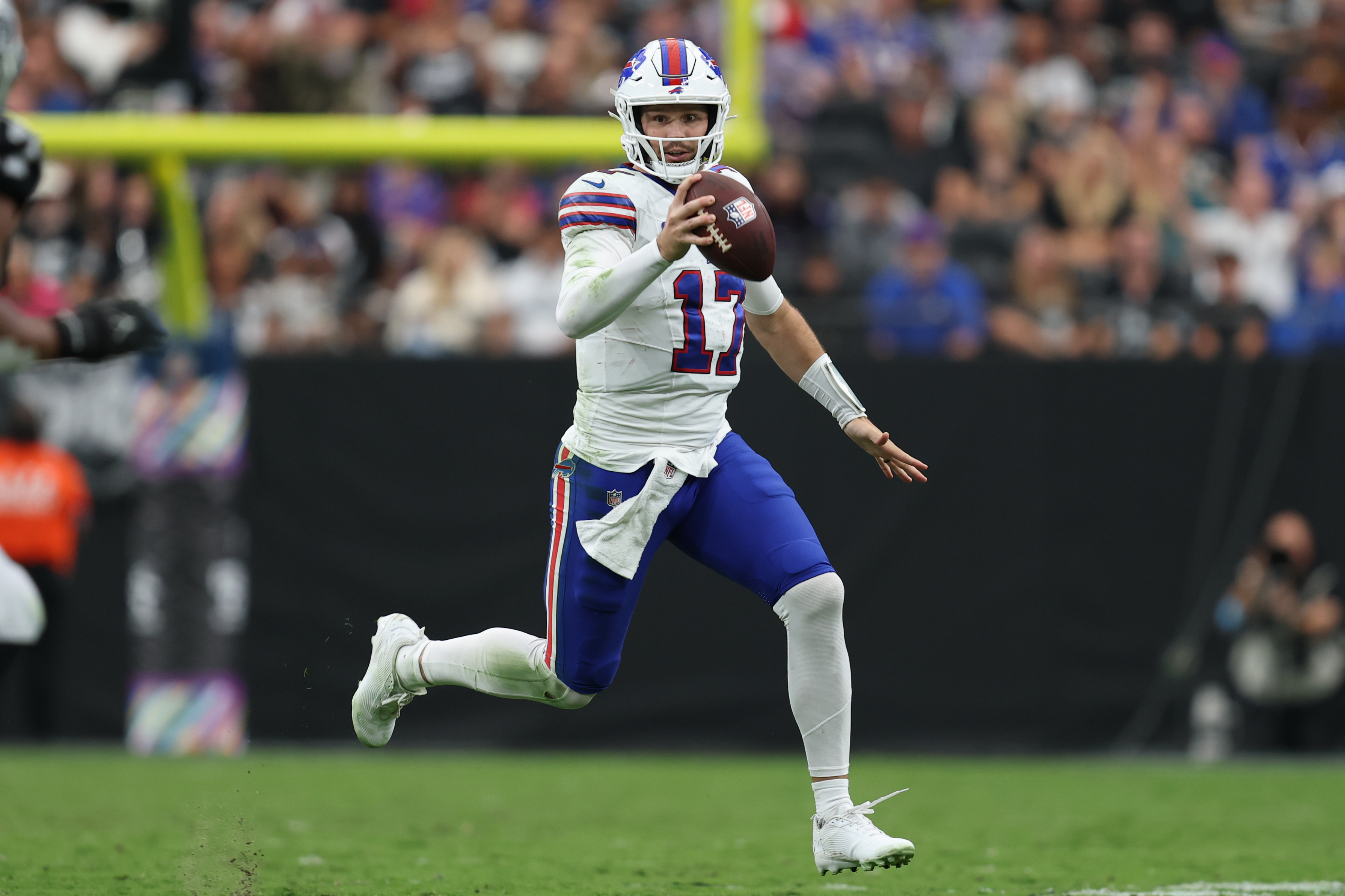 Buffalo Bills quarterback Josh Allen (17) runs with the ball in the third quarter against the Las Vegas Raiders as we look at the NFL MVP odds.