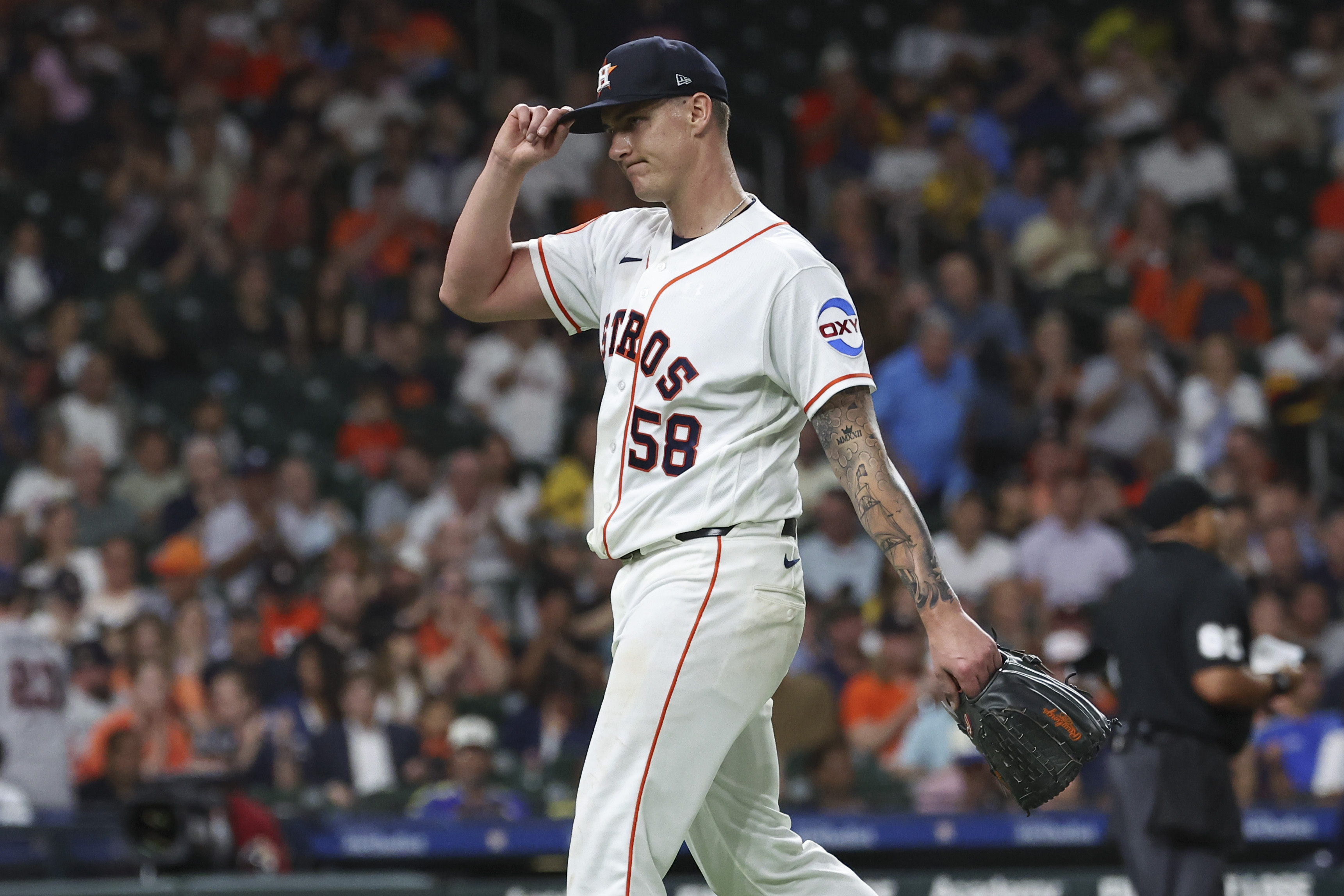 Houston Astros starting pitcher Hunter Brown - who's featured in my best NRFI bets today - tips his cap.