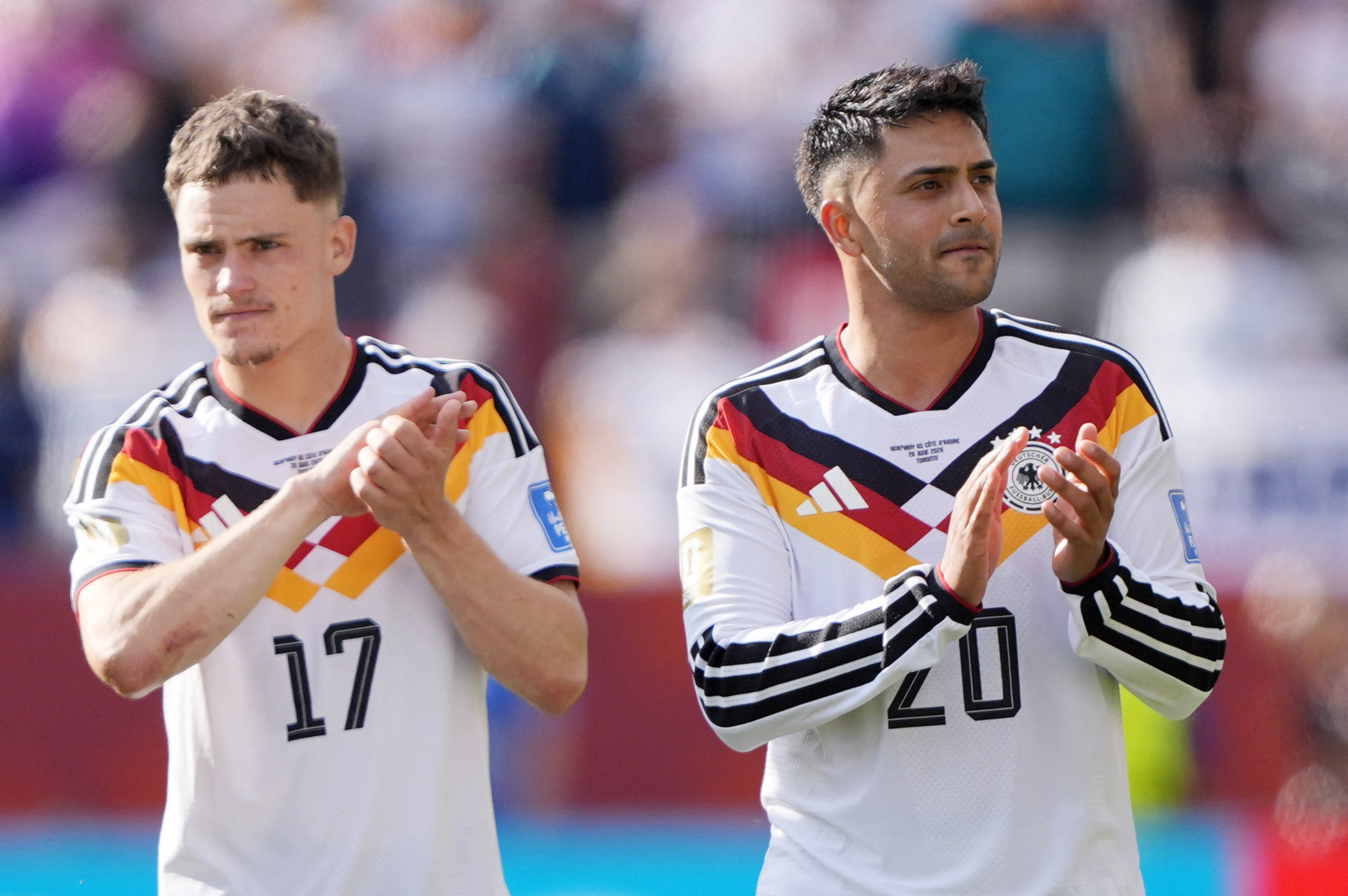 Germany's Florian Wirtz and Nadiem Amiri celebrate as we make our best Ecuador vs. Germany predictions. 