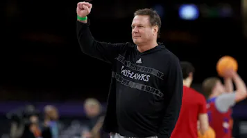 Head coach Bill Self of the Kansas Jayhawks looks on during practice as we dive into the 2024 Big 12 conference odds.