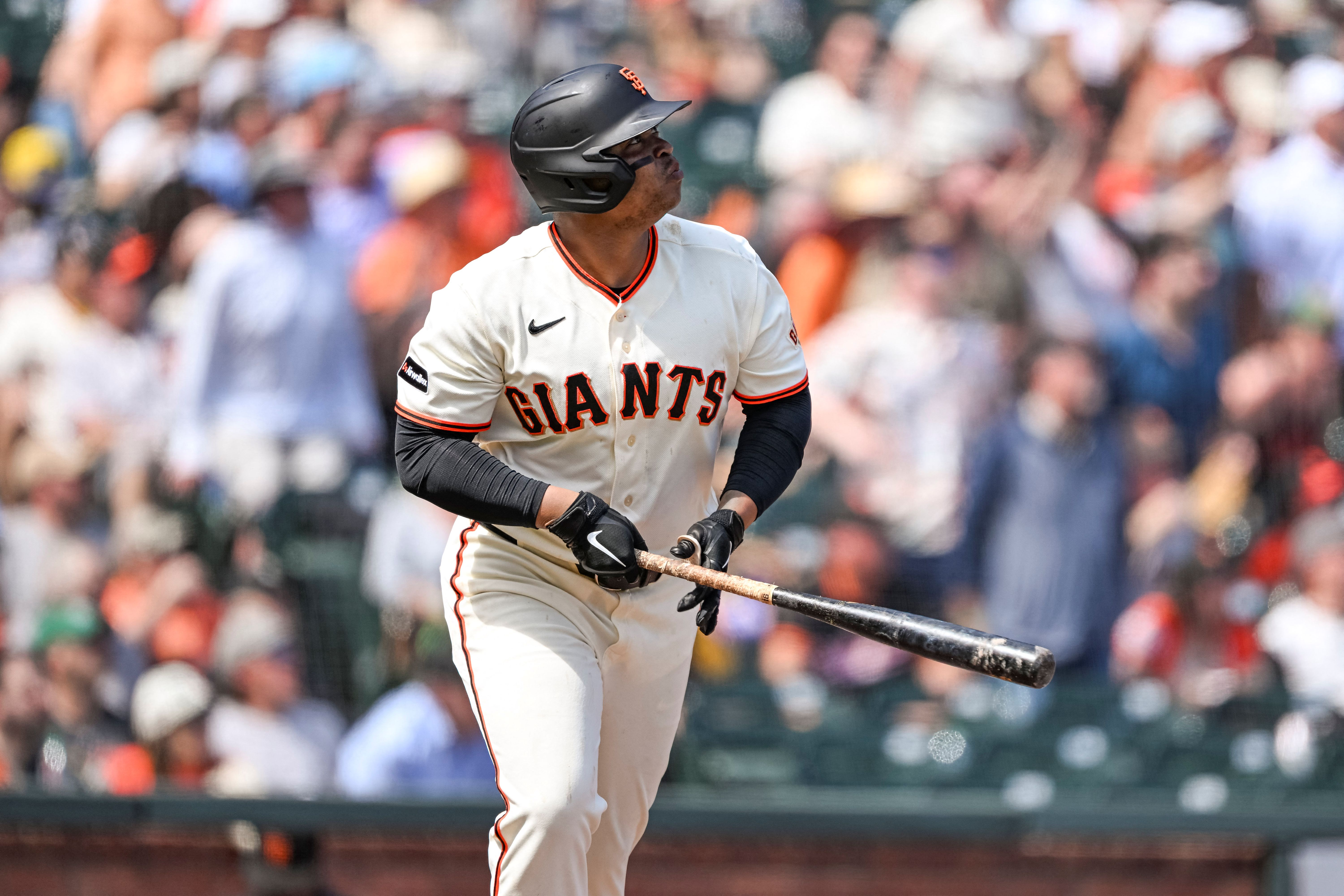 San Francisco Giants designated hitter Rafael Devers looks on after hitting a three-run home as we make our best Giants vs. Orioles prediction. 