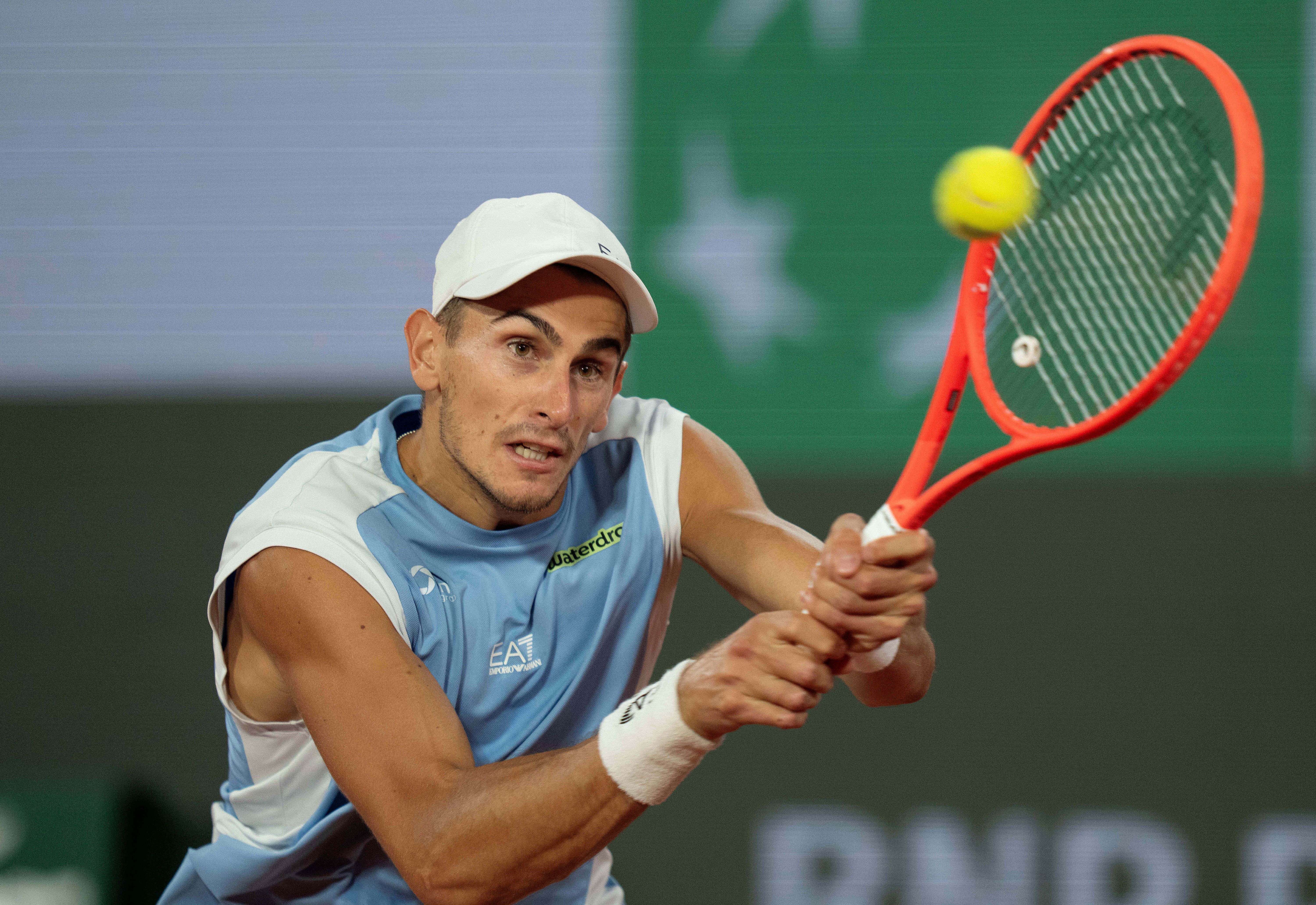 Matteo Arnaldi of Italy returns a shot as we make our best Arnaldi vs. Cobolli prediction for their French Open semifinal. 