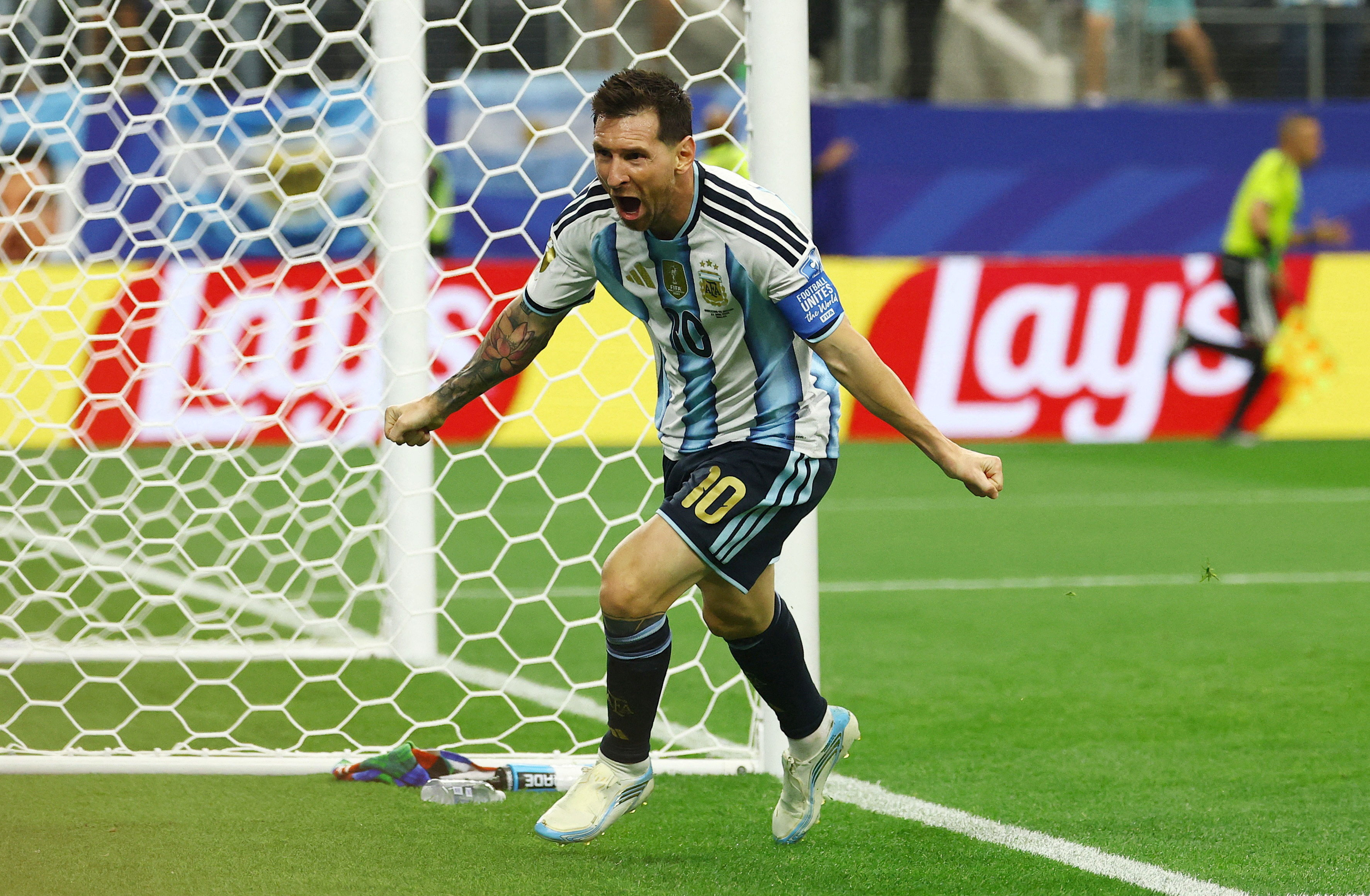 Lionel Messi celebrates scoring their second goal. 