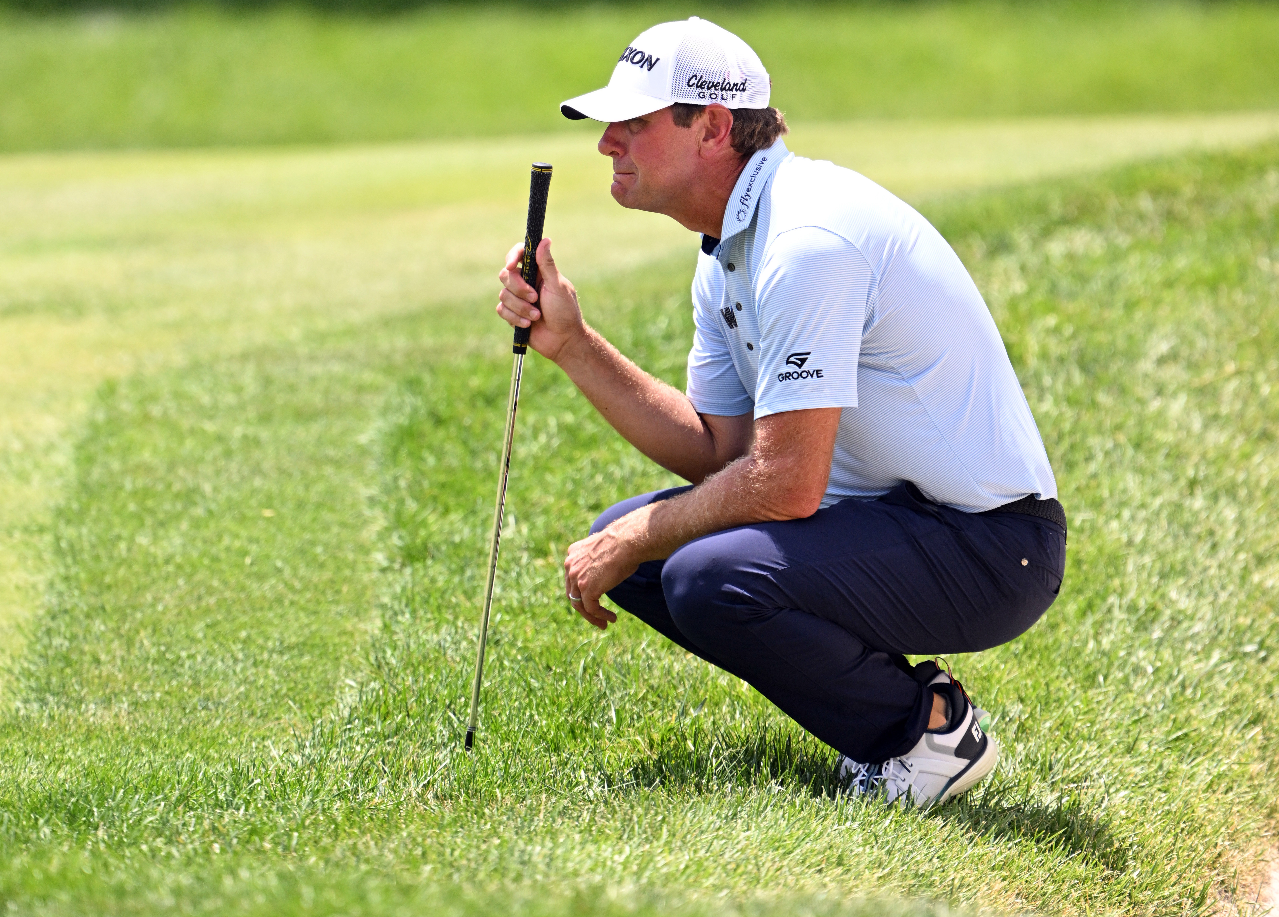 Lucas Glover lines up his putt as he is featured in our John Deere Classic Third-Round Leader prediction & odds.