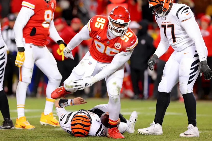 Chris Jones #95 of the Kansas City Chiefs sacks Joe Burrow #9 of the Cincinnati Bengals during the fourth quarter in the AFC Championship Game at GEHA Field at Arrowhead Stadium on January 29, 2023 in Kansas City, Missouri.