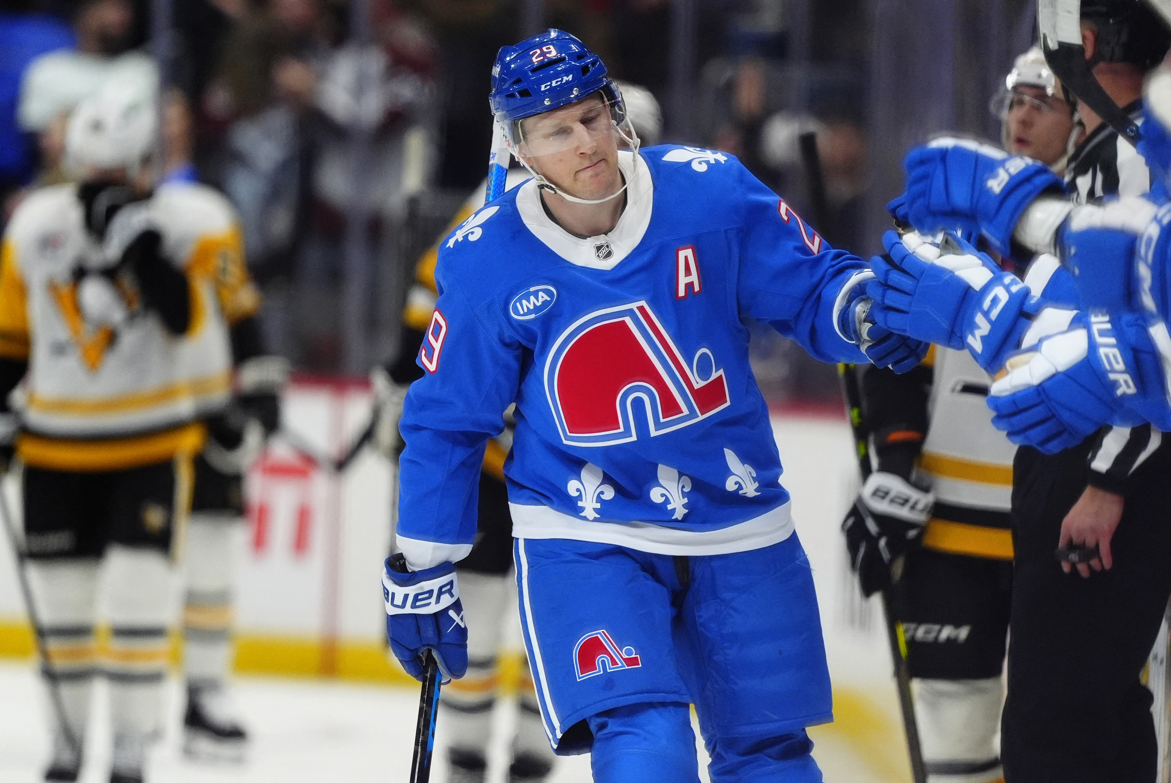 Nathan MacKinnon celebrates a goal as we provide the Stanley Cup Odds and favorites.