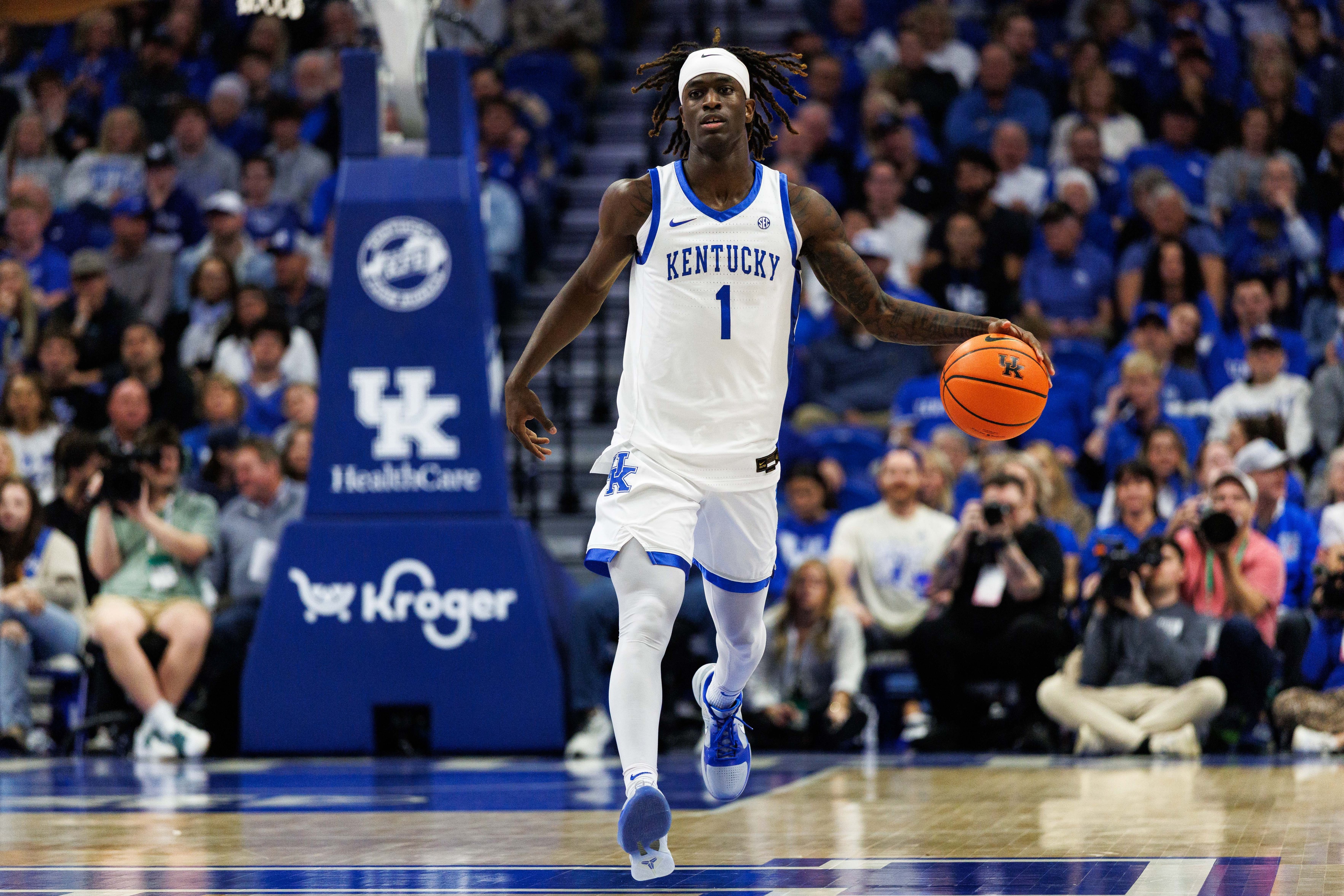 Kentucky Wildcats guard Denzel Aberdeen (1) brings the ball up court as part of our college basketball best bets & player props tonight.