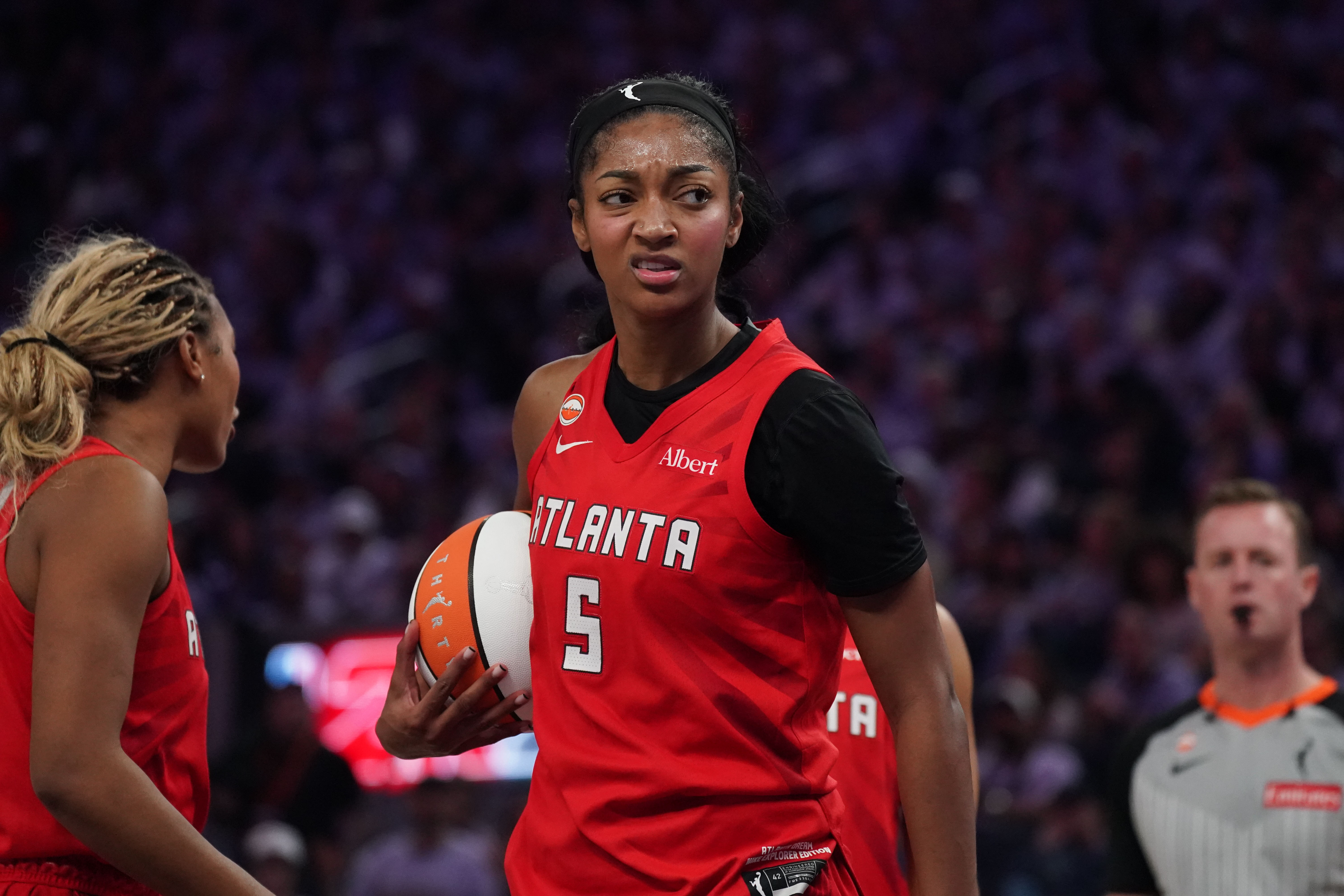 Atlanta Dream forward Angel Reese (5) reacts after being fouled by the Golden State Valkyries as we take a closer look at the WNBA Championship odds.