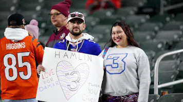 Fans hold a sign for Damar Hamlin during warmups prior to the game between the Cincinnati Bengals and the Buffalo Bills at Paycor Stadium as we look at the 2023 comeback player of the year odds.