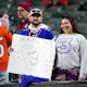 Fans hold a sign for Damar Hamlin during warmups prior to the game between the Cincinnati Bengals and the Buffalo Bills at Paycor Stadium as we look at the 2023 comeback player of the year odds.