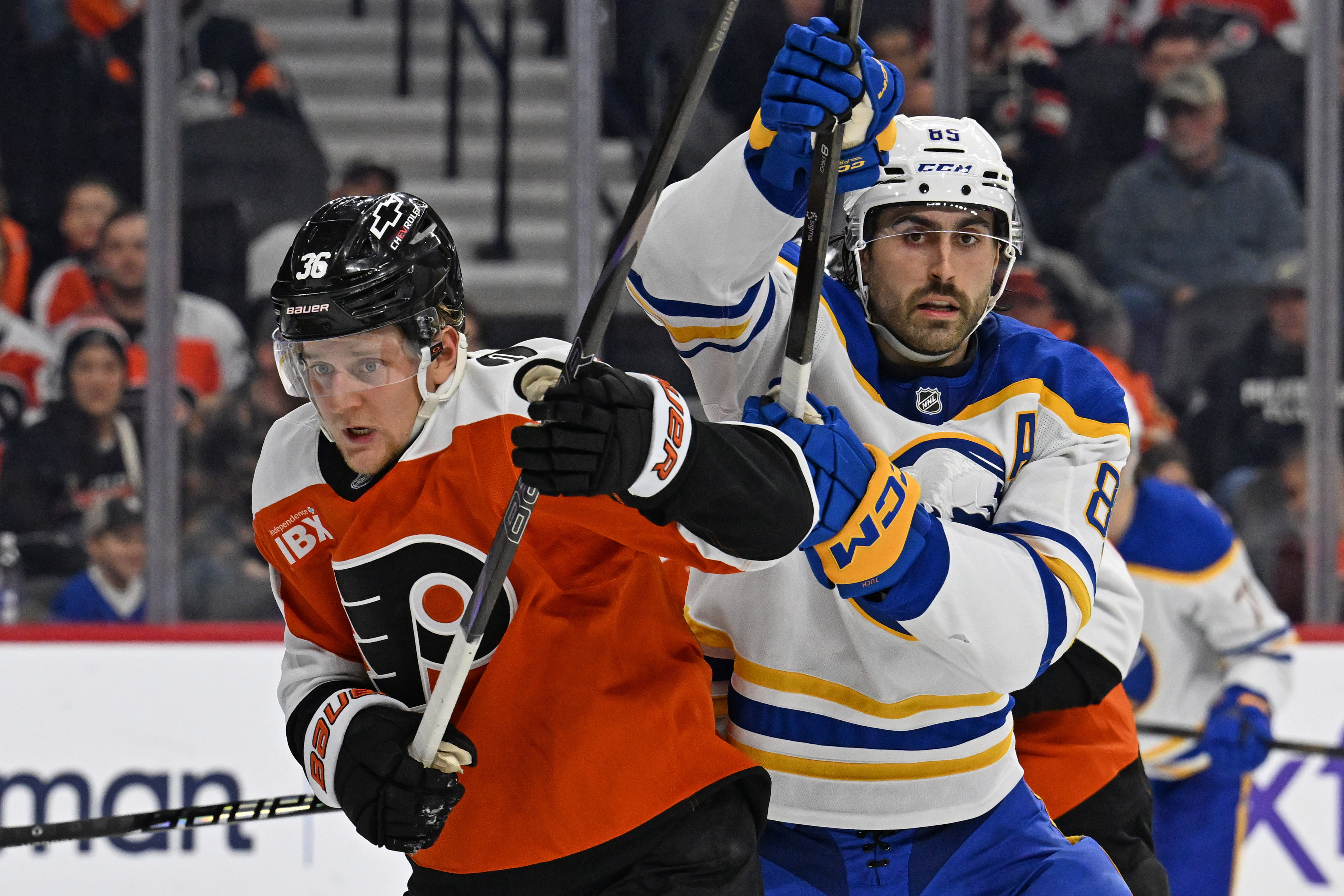  Philadelphia Flyers defenseman Emil Andrae (36) and Buffalo Sabres right wing Alex Tuch (89) battle for position as we offer our Flyers vs. Sabres prediction.