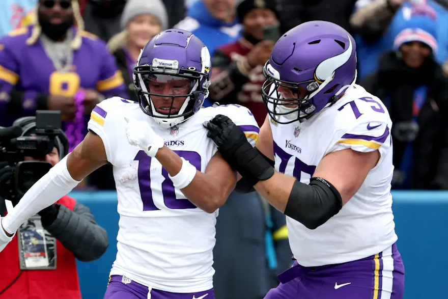 Justin Jefferson of the Minnesota Vikings celebrates with Brian O'Neill of the Minnesota Vikings after Jefferson's touchdown.