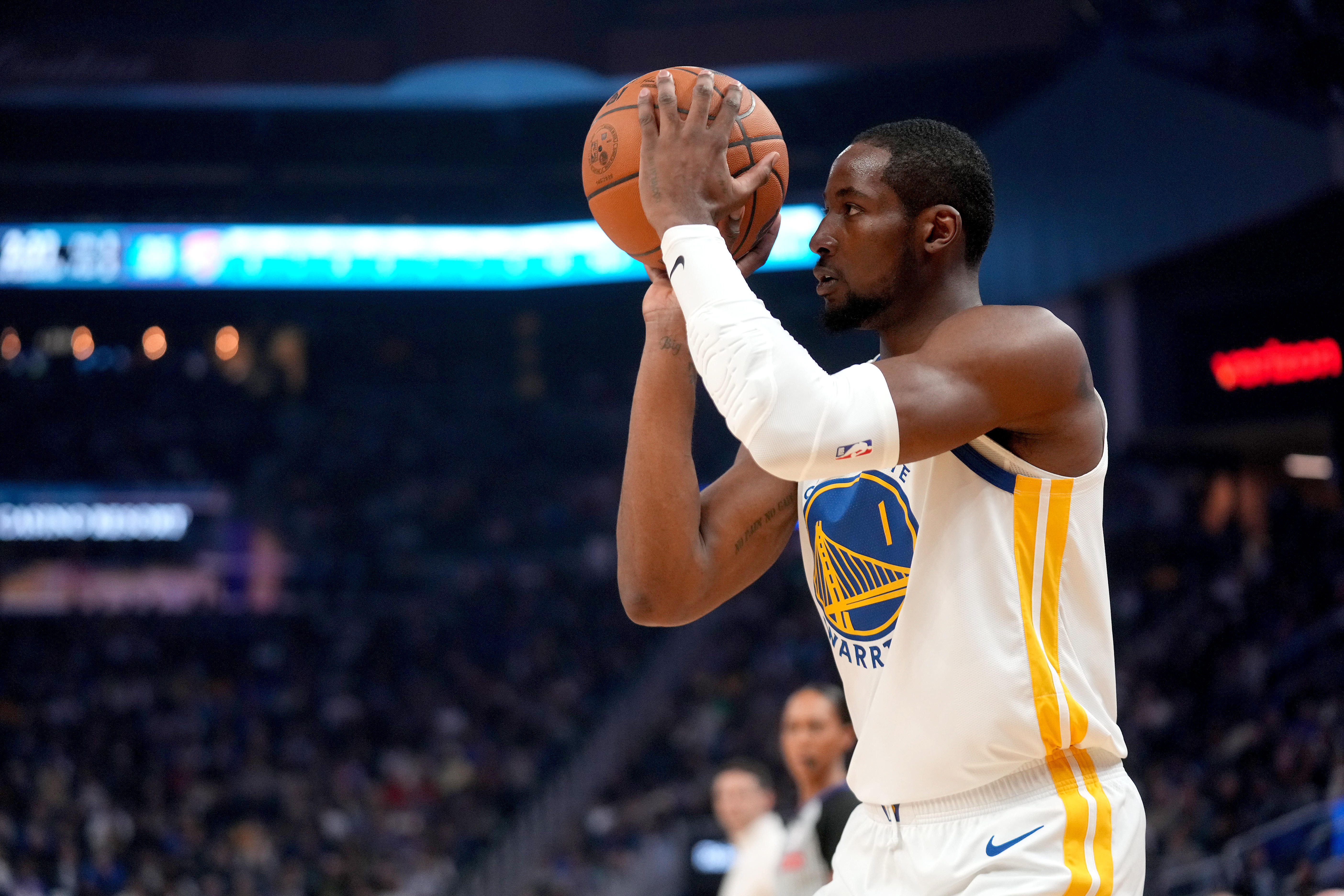 Golden State Warriors forward Jonathan Kuminga shoots as we offer our NBA player props & best bets today
