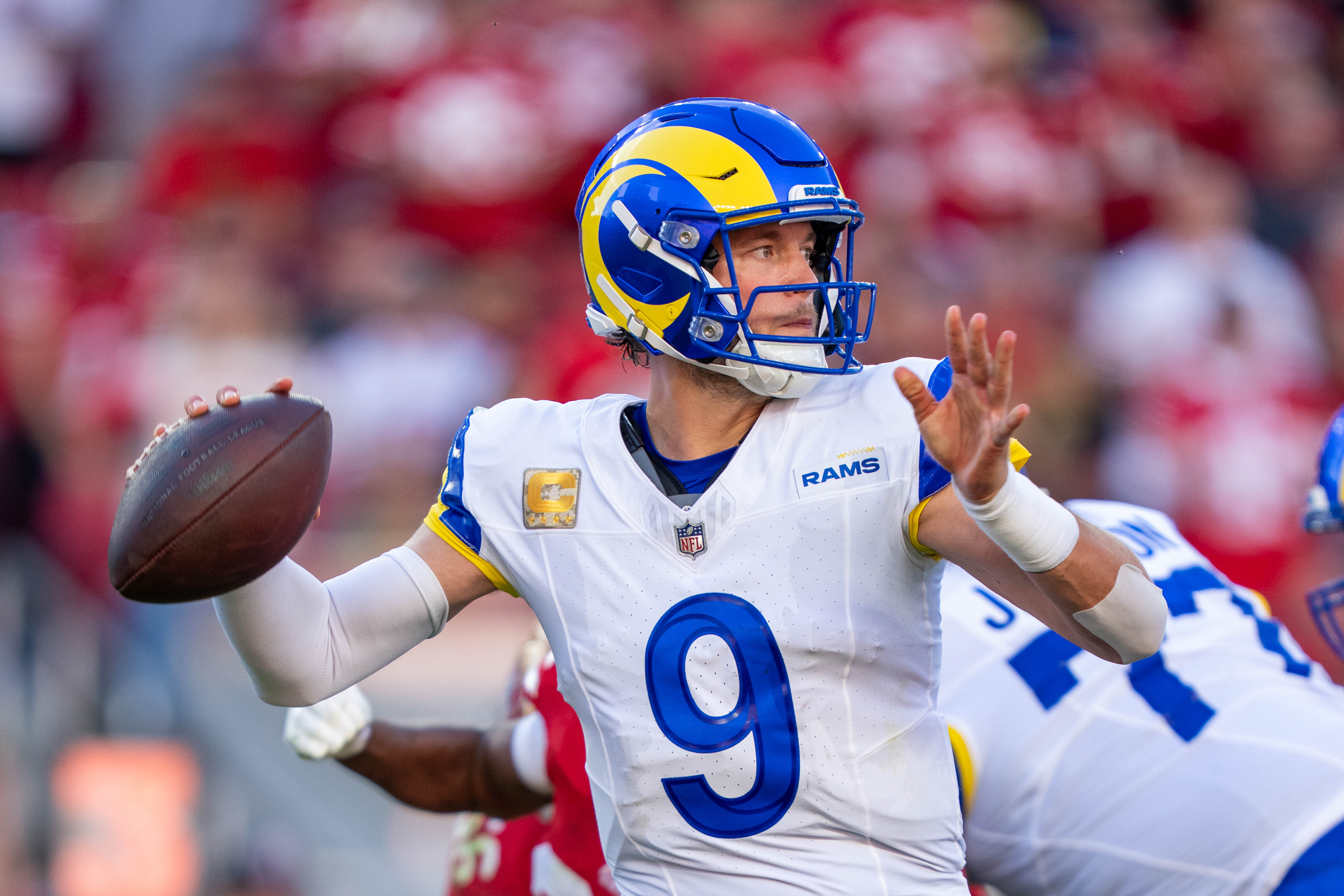 Los Angeles Rams quarterback Matthew Stafford (9) throws a pass as we provide our 49ers vs. Rams prediction.