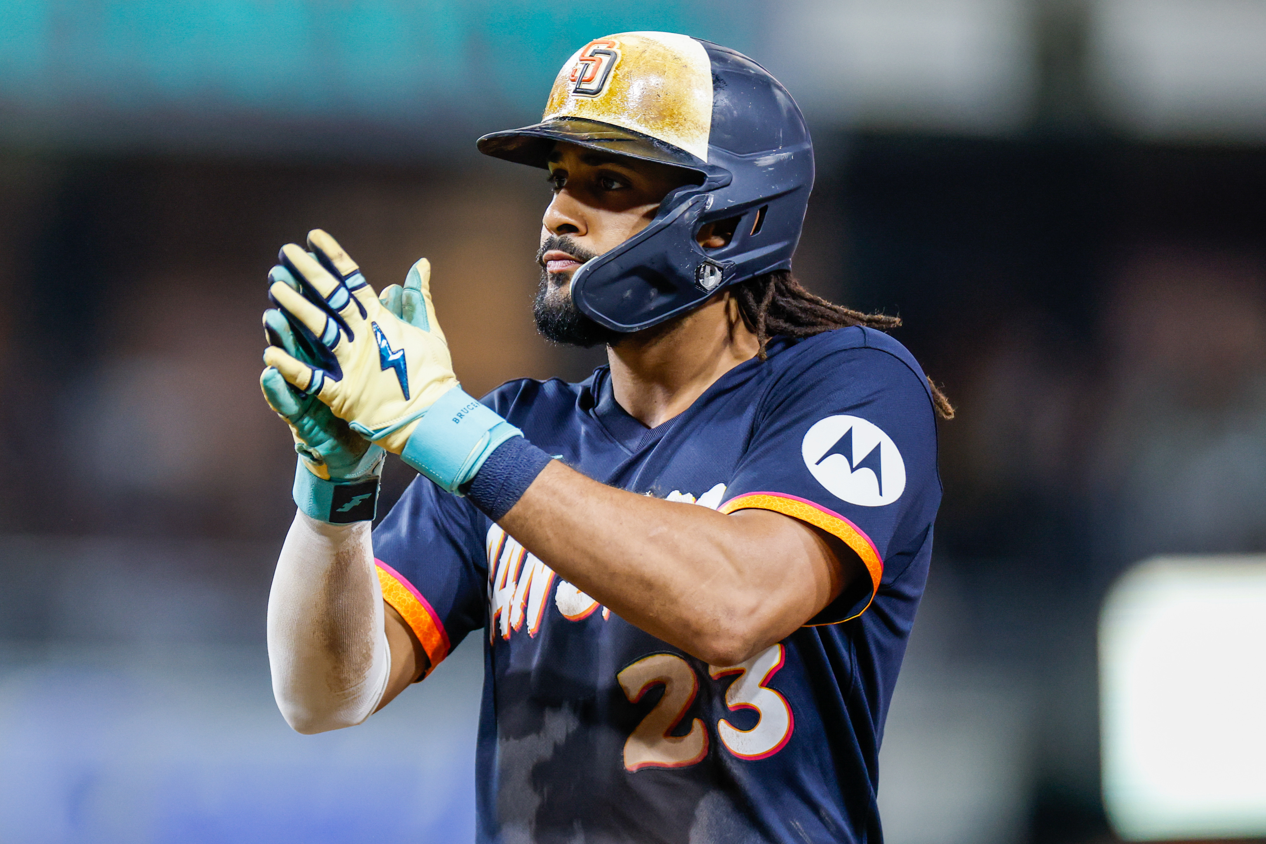 San Diego Padres right fielder Fernando Tatis Jr. (23) celebrates as we break down our home run predictions today.