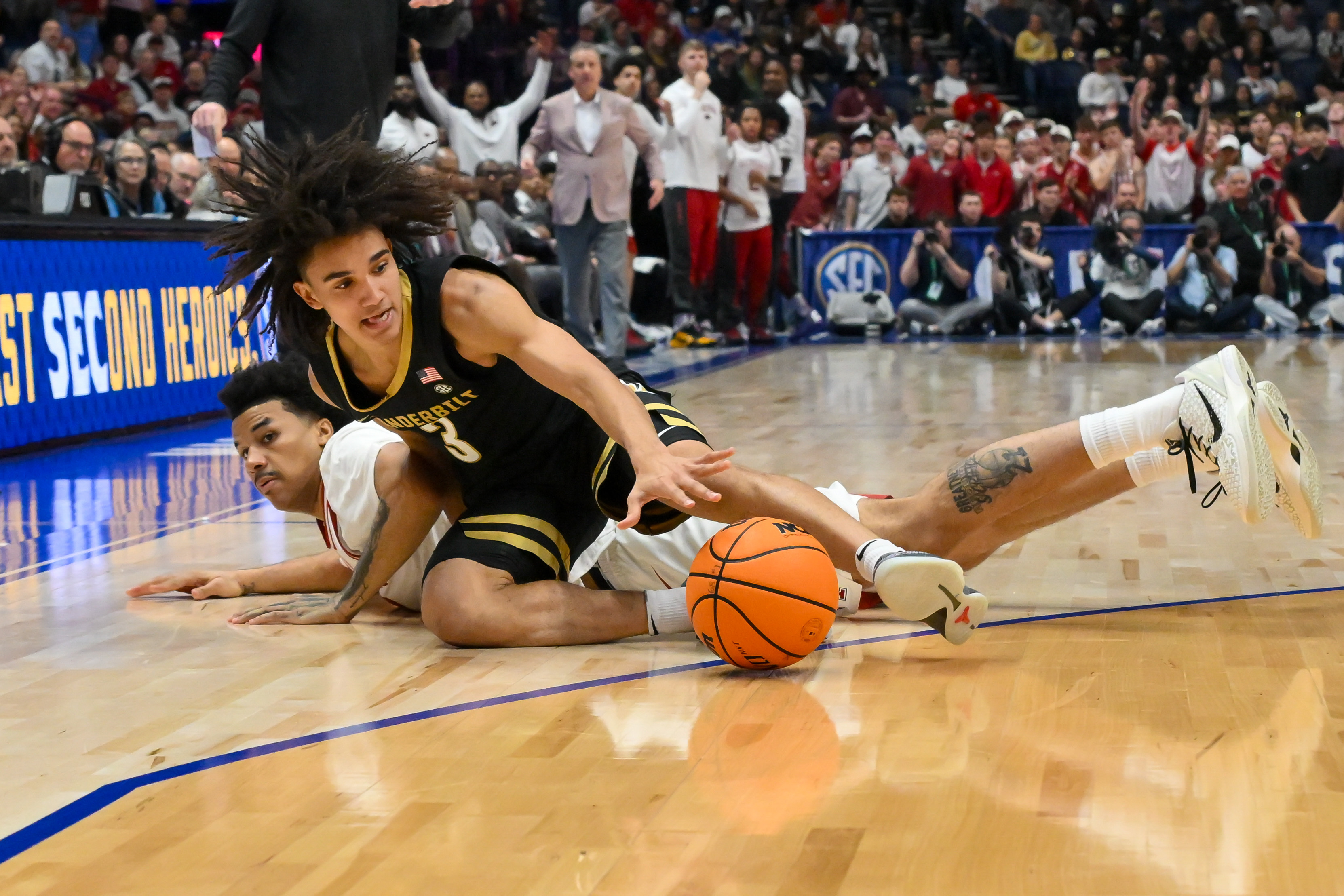 Vanderbilt Commodores guard Tyler Tanner (3), who is featured in our McNeese vs. Vanderbilt prediction, fights for the loose ball.