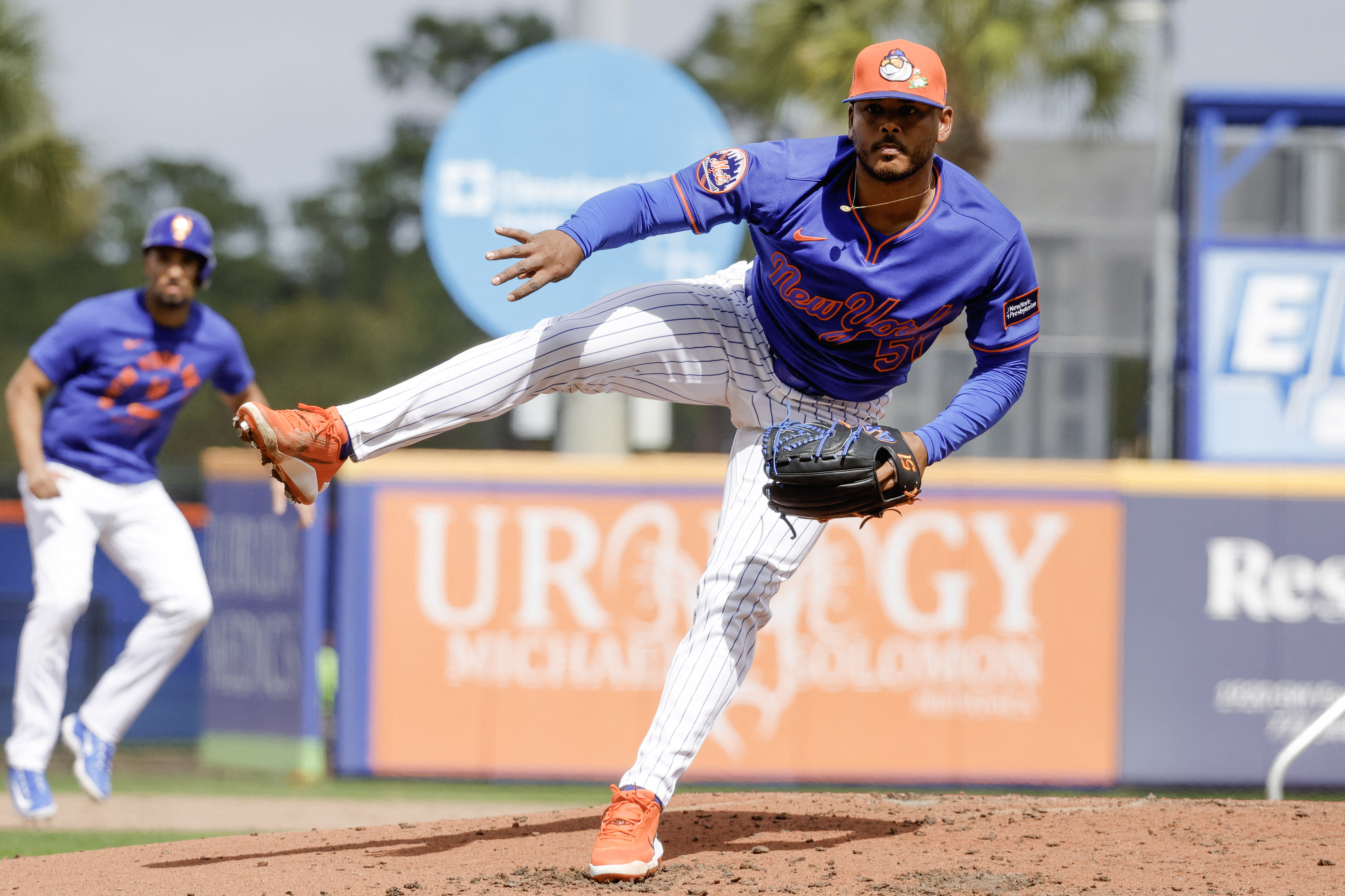 New York Mets pitcher Freddy Peralta throws a pitch as we make our best Pirates vs. Mets prediction & picks.