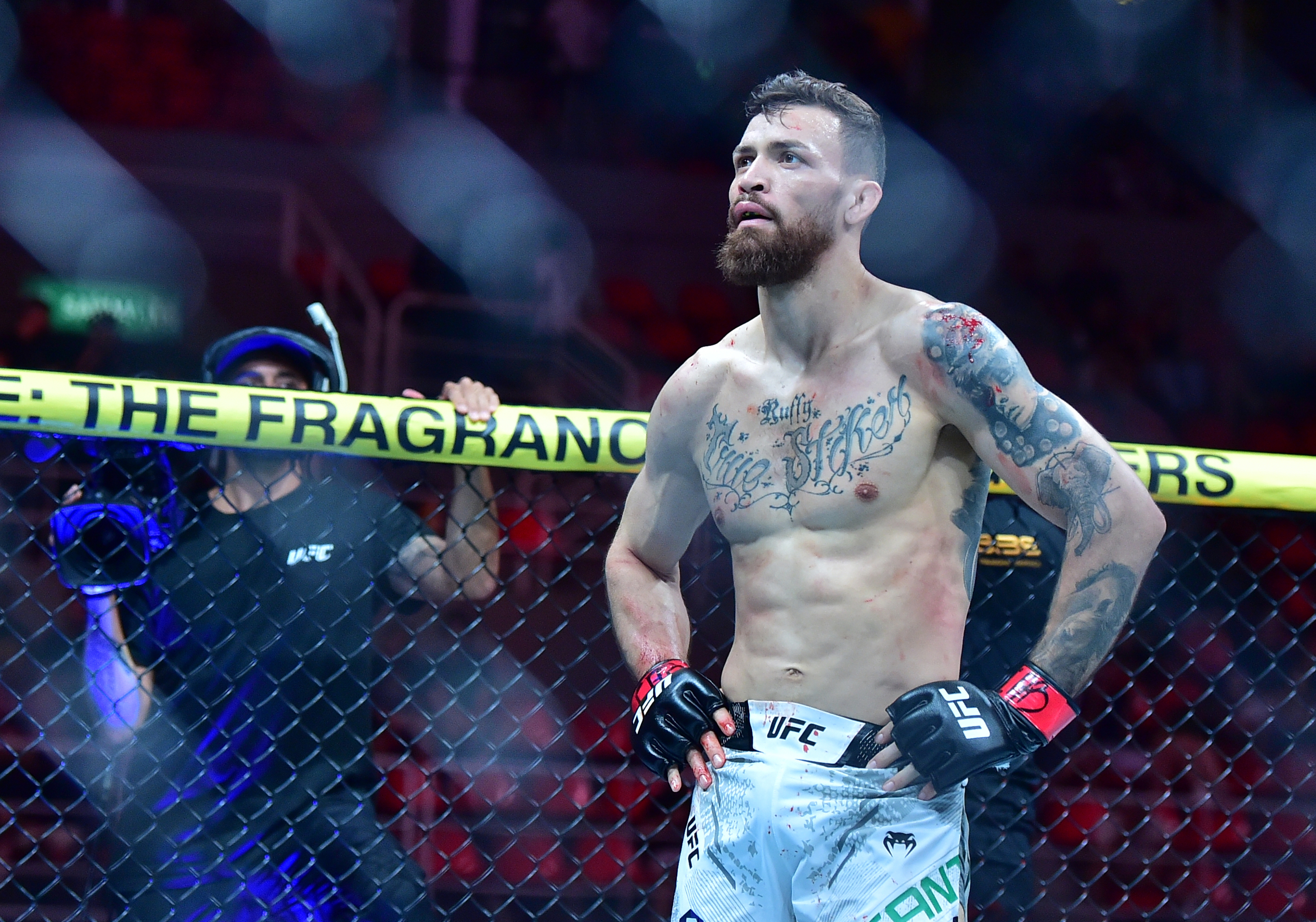  Mauricio Ruffy (red gloves) fights as we break down our Michael Chandler vs. Mauricio Ruffy prediction.