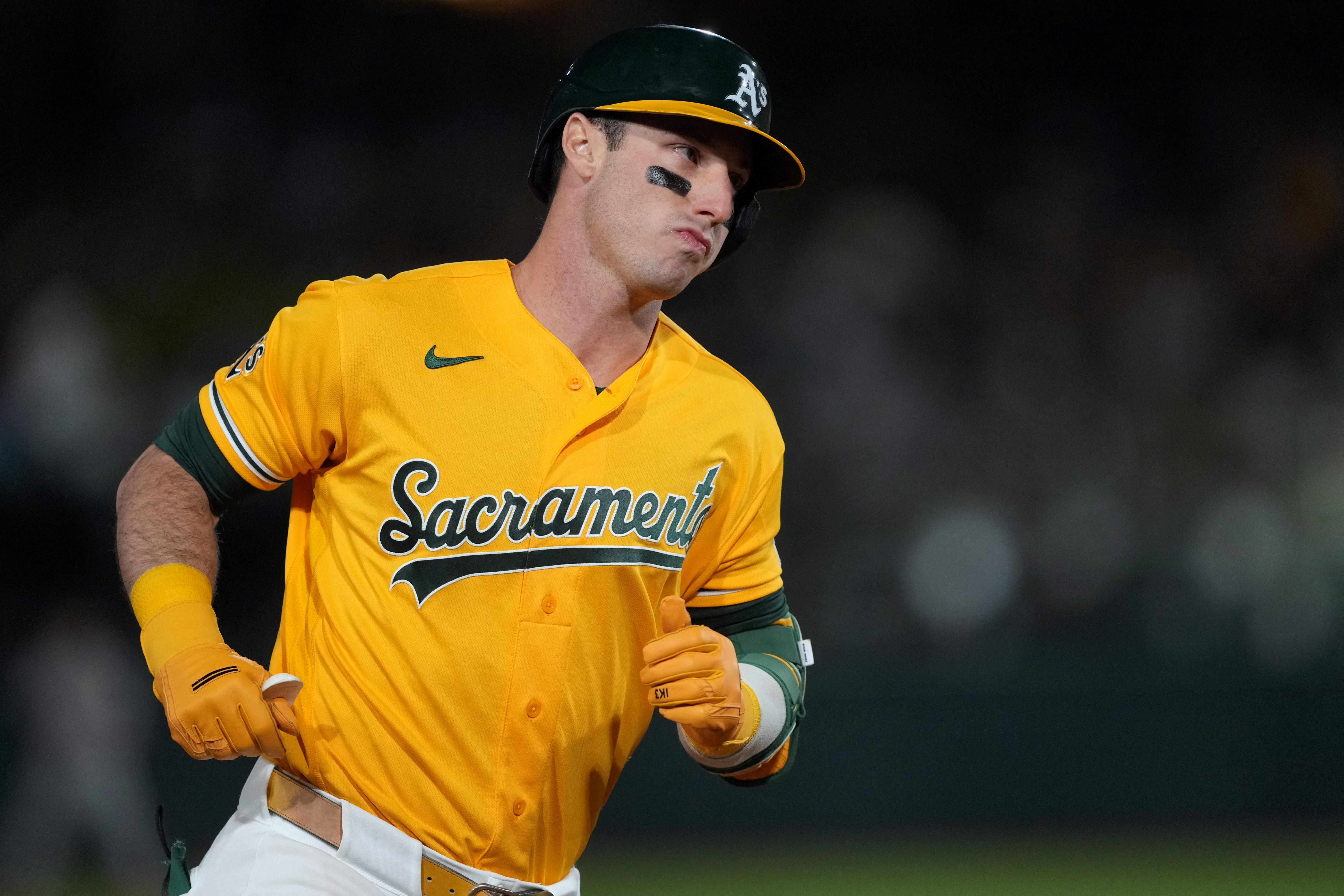 Athletics designated hitter Brent Rooker (25) rounds the bases as we break down our home run predictions tonight.