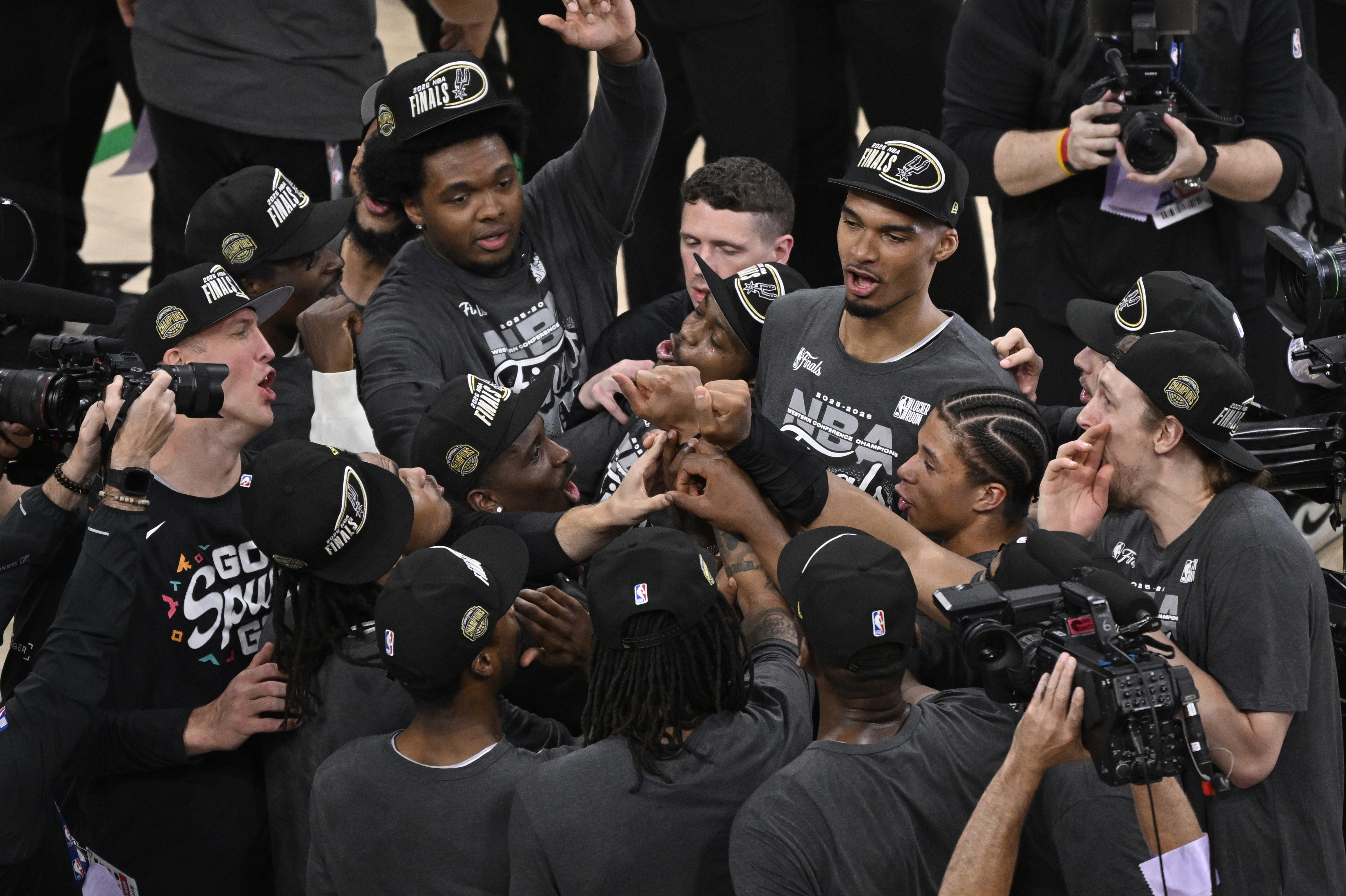 San Antonio Spurs forward Victor Wembanyama (1) celebrates with teammates as we break down the 2026 NBA championship odds.
