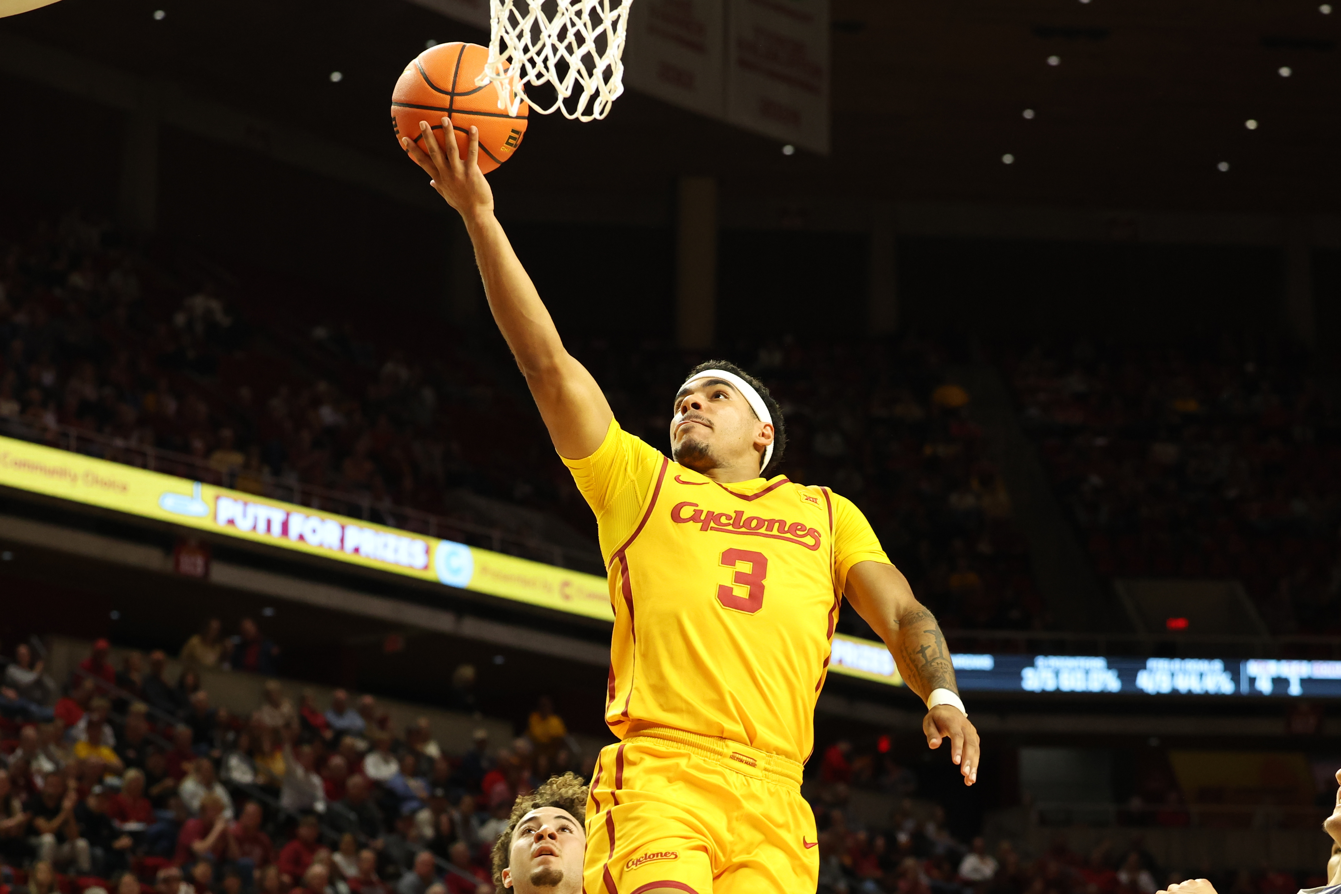 Iowa State Cyclones guard Tamin Lipsey scores as we make our best college basketball bets.