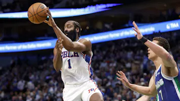 James Harden of the Philadelphia 76ers passes the ball against the Dallas Mavericks at American Airlines Center on Mar. 2, 2023 in Dallas, Texas.