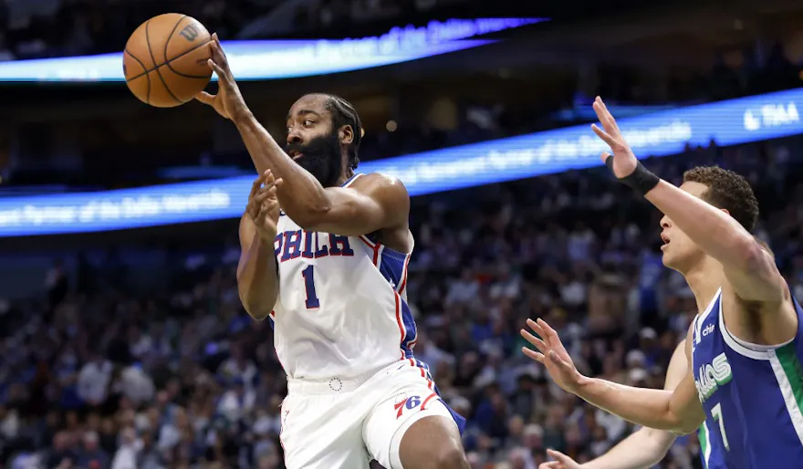 James Harden of the Philadelphia 76ers passes the ball against the Dallas Mavericks at American Airlines Center on Mar. 2, 2023 in Dallas, Texas.