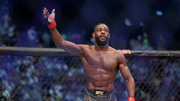 Aljamain Sterling reacts after winning the bantamweight championship at the UFC event in Abu Dhabi, and we offer new U.S. bettors our exclusive BetRivers promo code for UFC 292.