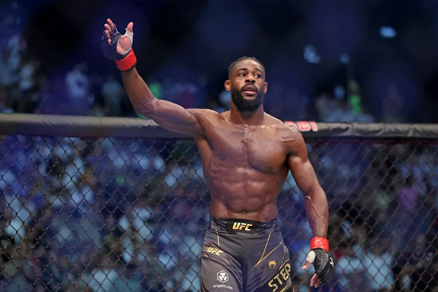 Aljamain Sterling reacts after winning the bantamweight championship at the UFC event in Abu Dhabi, and we offer new U.S. bettors our exclusive BetRivers promo code for UFC 292.